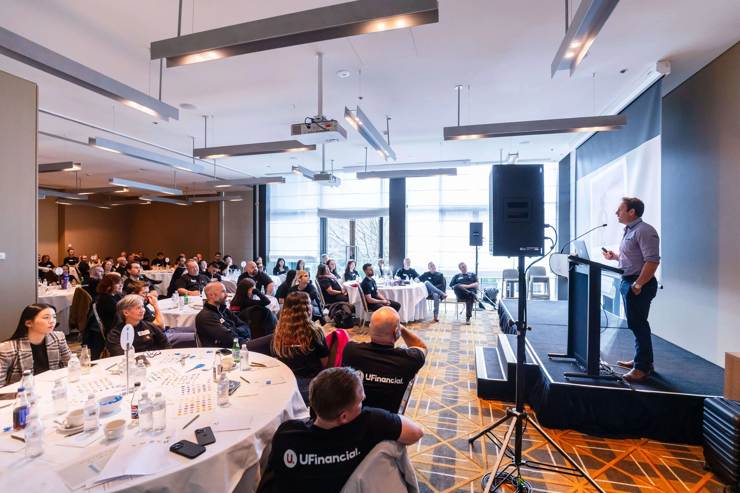 Mark Visser delivering a keynote and workshop presentation to a corporate audience in Australia.