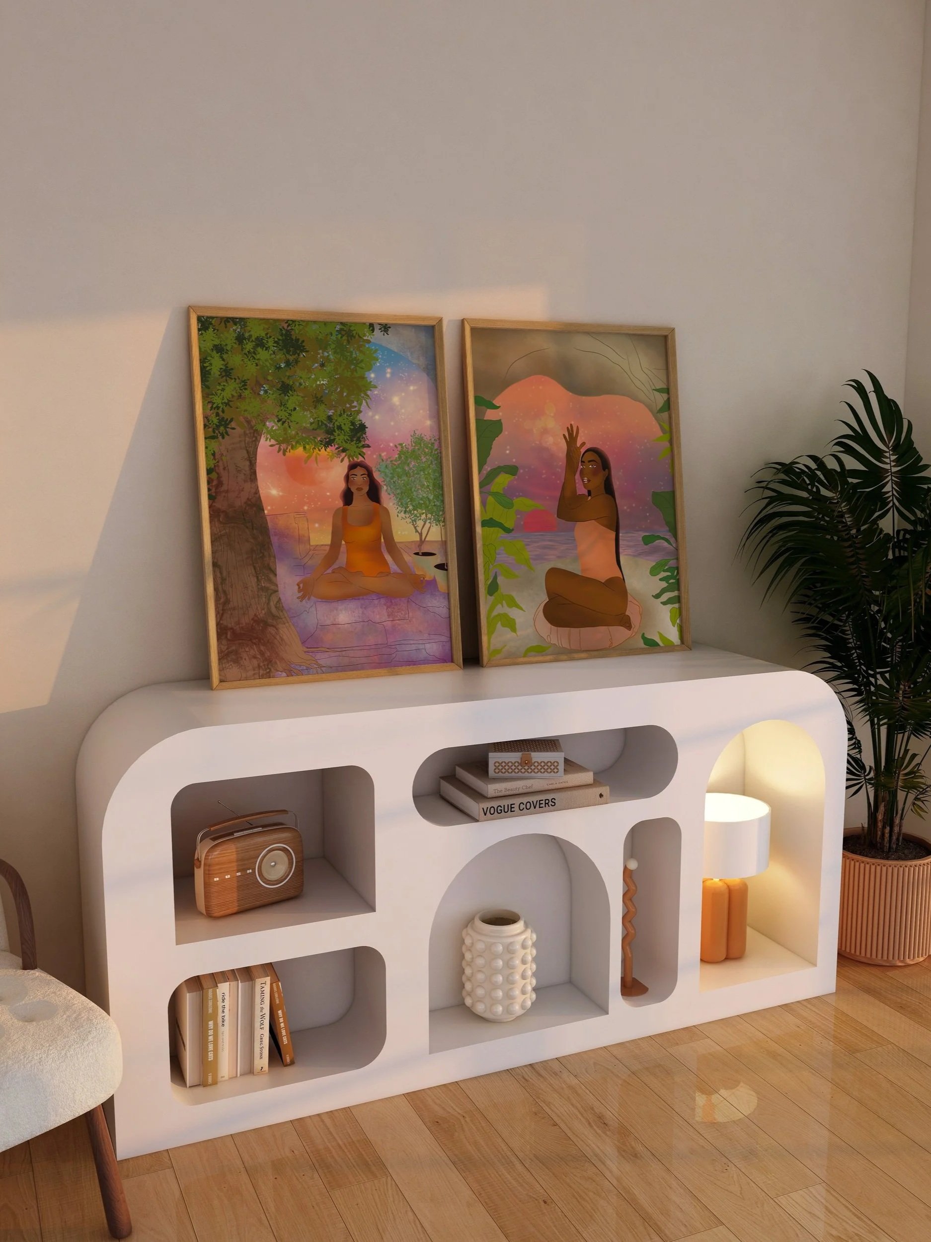 Two framed abstract illustrations of women sitting outdoors, surrounded by trees and nature, at sunset or sunrise.