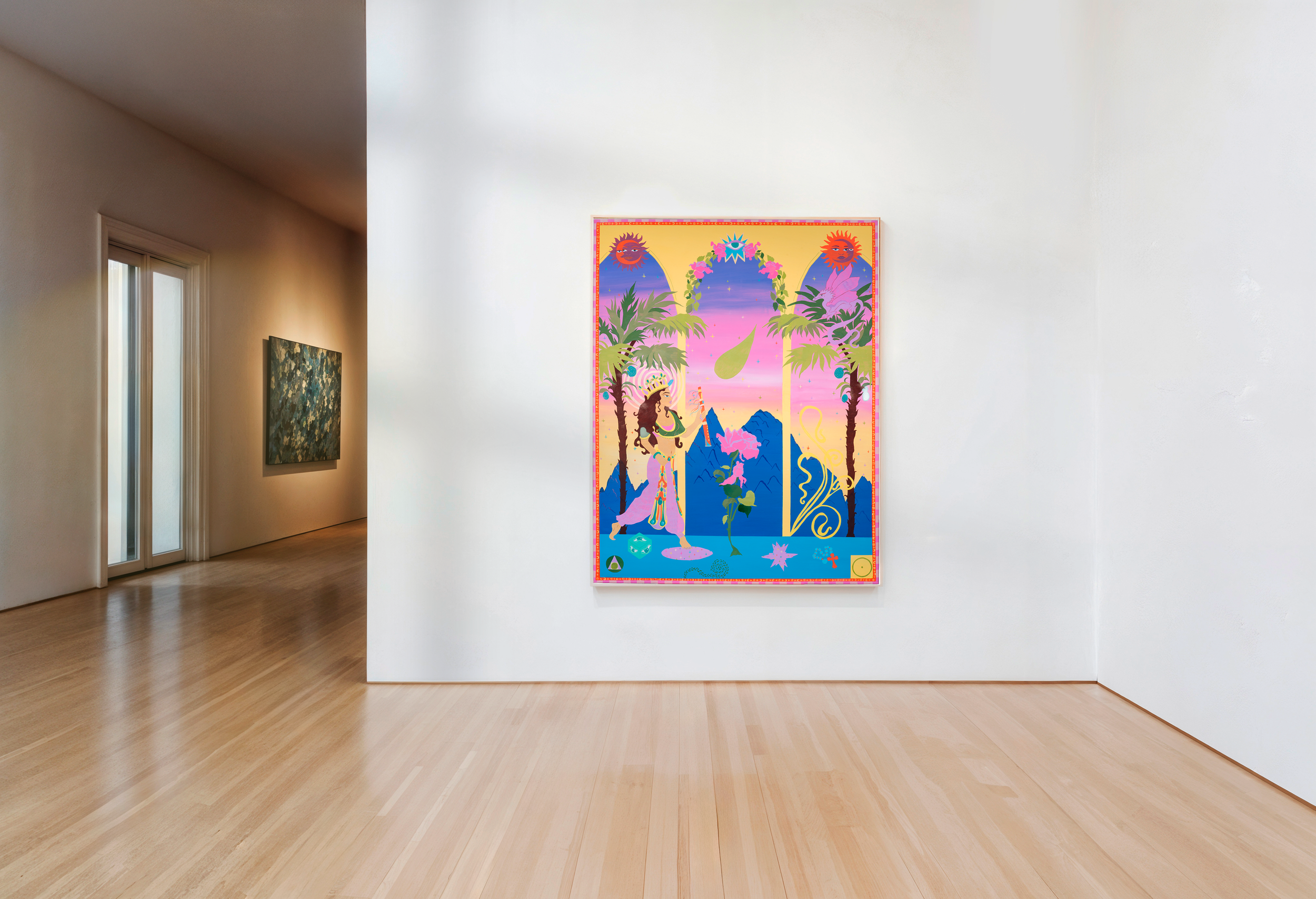 Colorful artwork featuring a woman in a pink dress, surrounded by tropical plants, mountains, and two flamingos, with sun and moon symbols at the top.