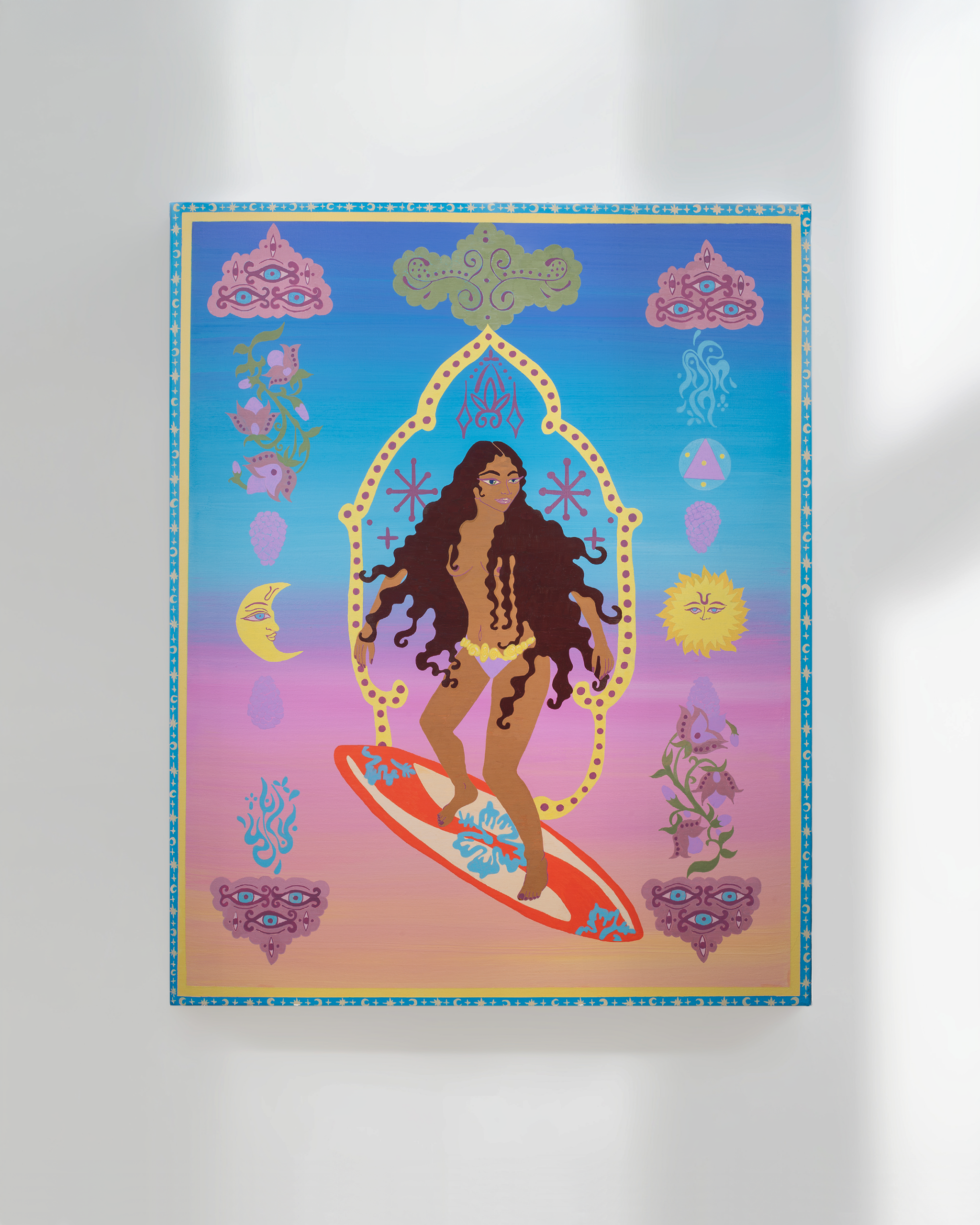 Colorful artistic poster depicting a woman with long, curly hair, standing on a surfboard against a gradient pink to purple background, surrounded by celestial and mystical symbols, including moons, suns, eyes, clouds, and floral motifs, all framed w