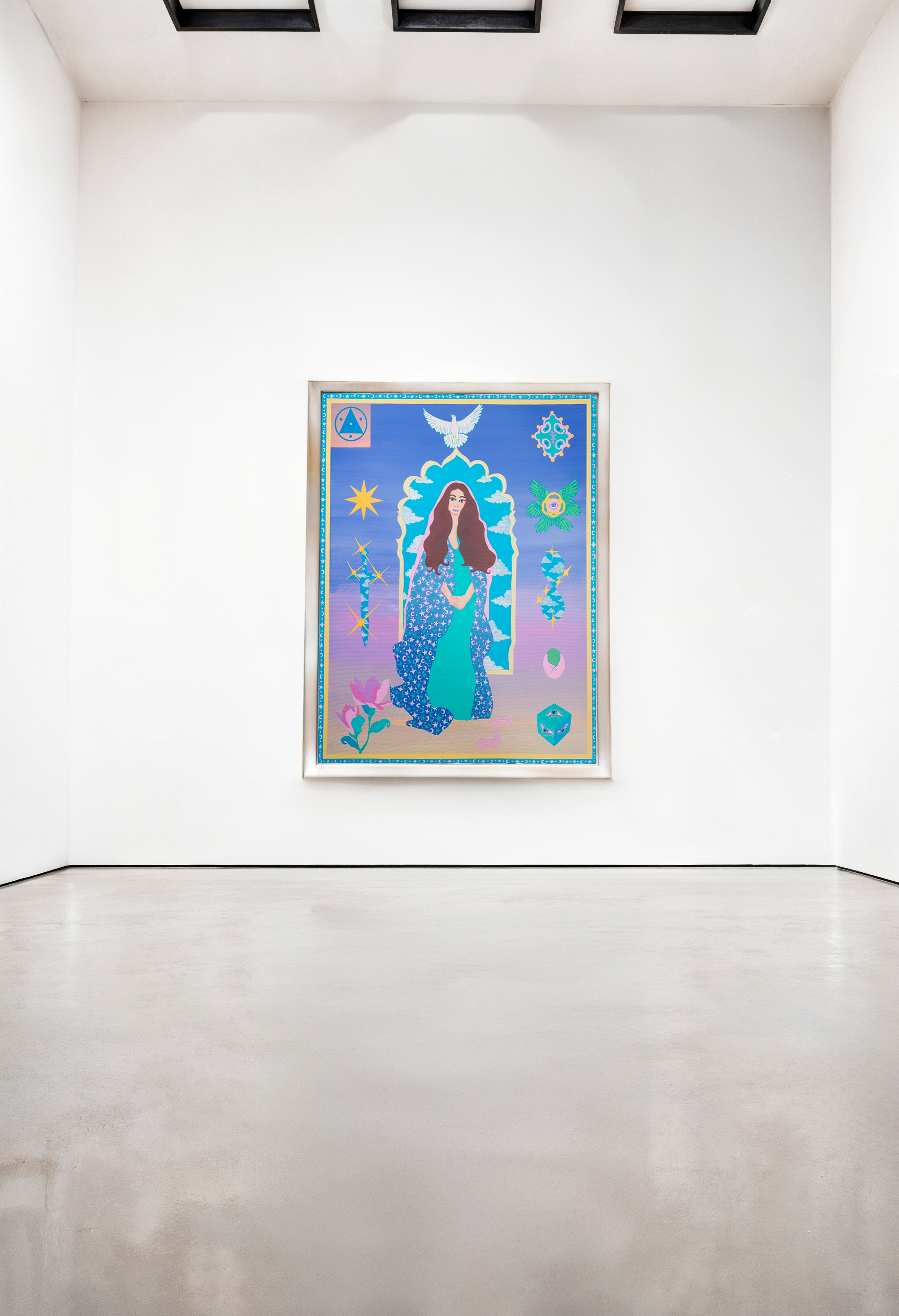 Artwork featuring a woman in a blue dress with brown hair, surrounded by mystical symbols and celestial imagery on a purple background, hung on a white wall in an art gallery.