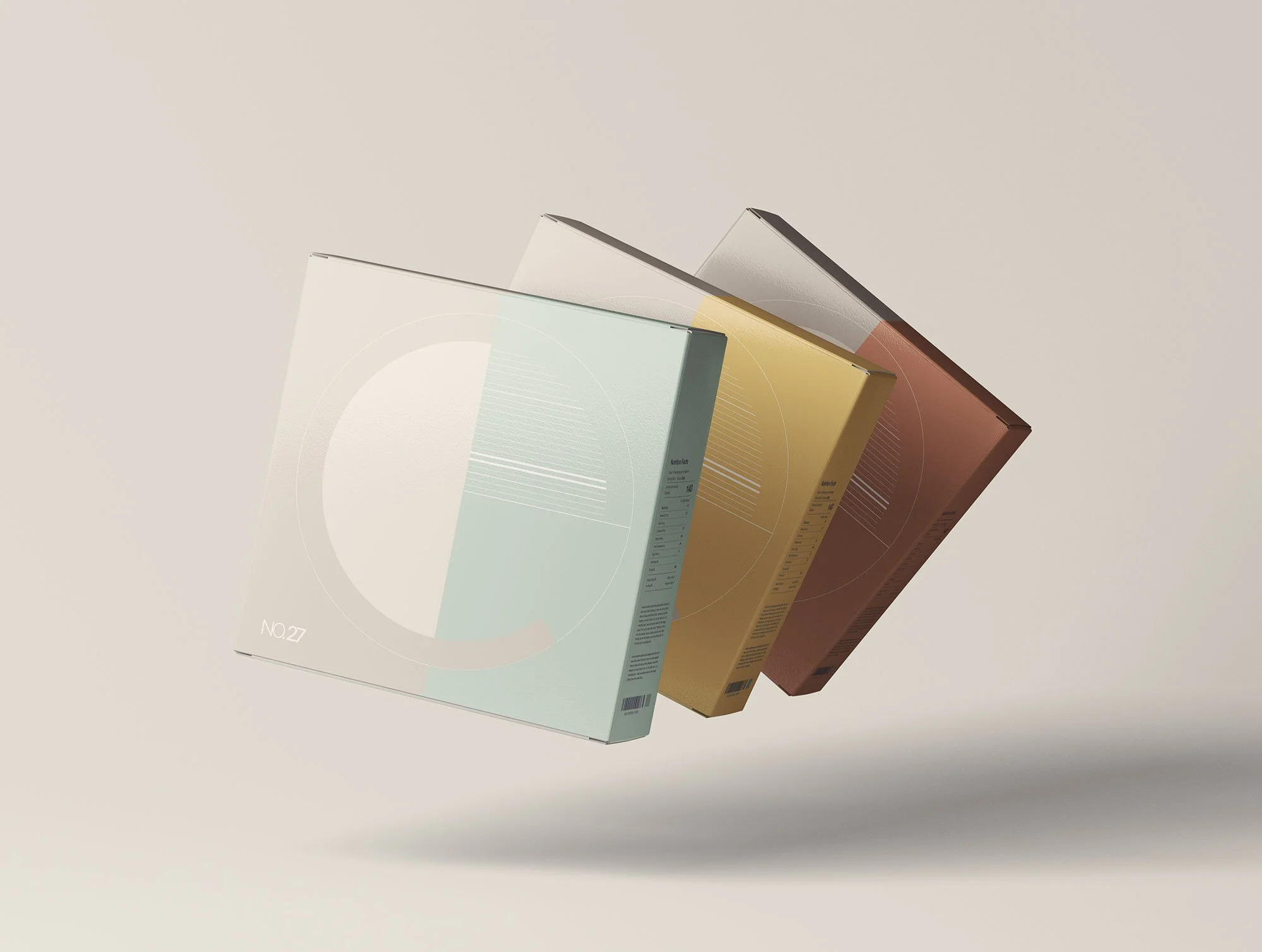 Three pastel-colored notebooks or planners in mint green, yellow, and rust arranged diagonally against a beige background.