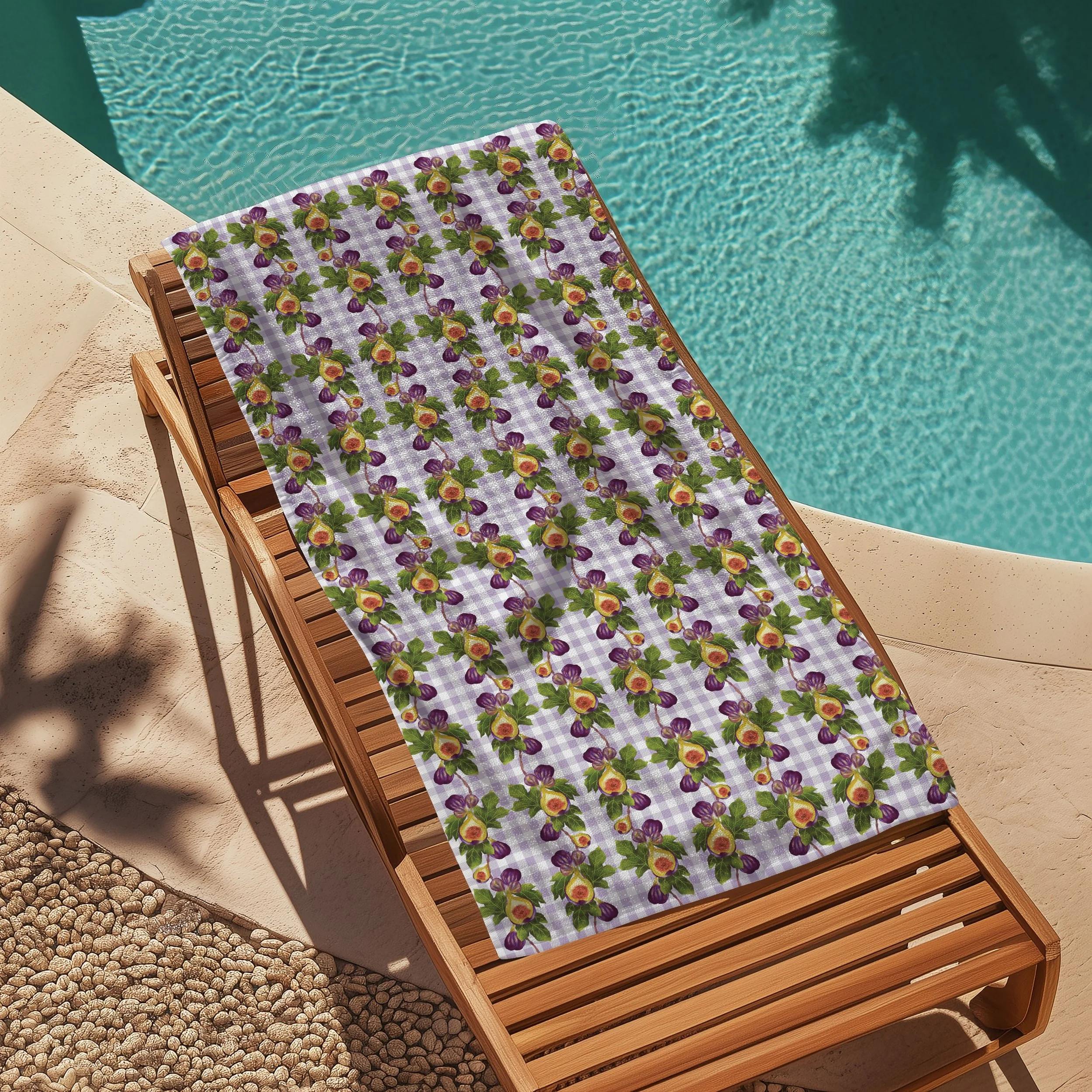 A wooden lounge chair with a white towel draped over it, situated next to a swimming pool with clear water.