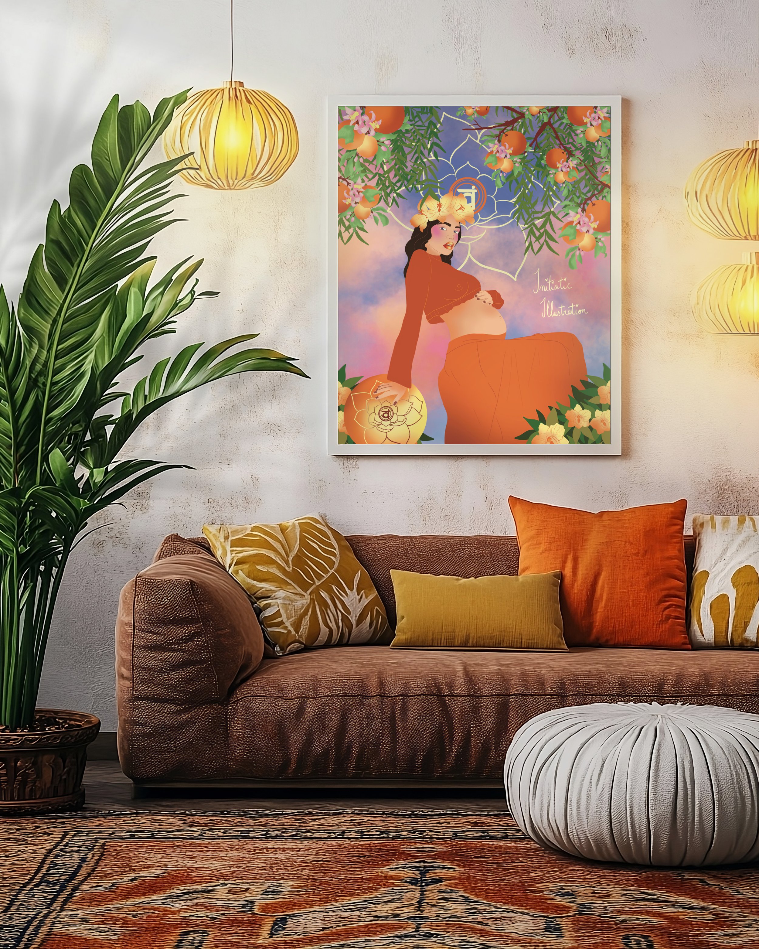 Living room with a brown textured sofa decorated with various yellow, orange, and cream pillows, a large potted plant with broad green leaves, a patterned area rug, hanging pendant lights, and a framed colorful illustration of a woman with flowers and foliage on the wall.