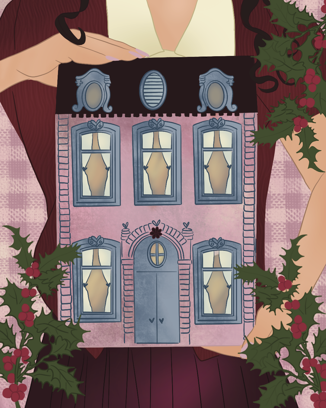A person is holding a paper cutout of a three-story pink house with blue trim, surrounded by holly branches with red berries. The house has six windows with drawn curtains and a front door with a small oval window.