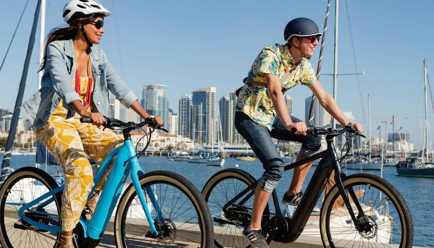 tourists riding rental e-bikes in hawaii