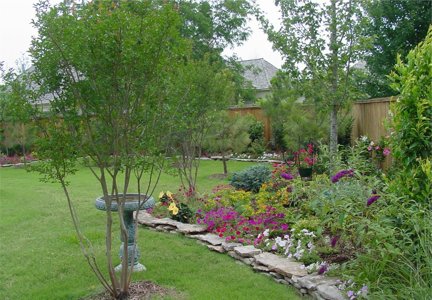 Custom landscaping in Tulsa combining planting and hardscaping features