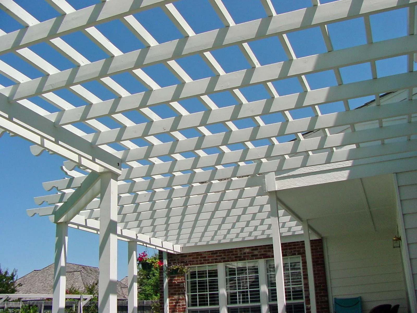 Custom outdoor arbor in Tulsa adding shade and architectural detail to the landscape