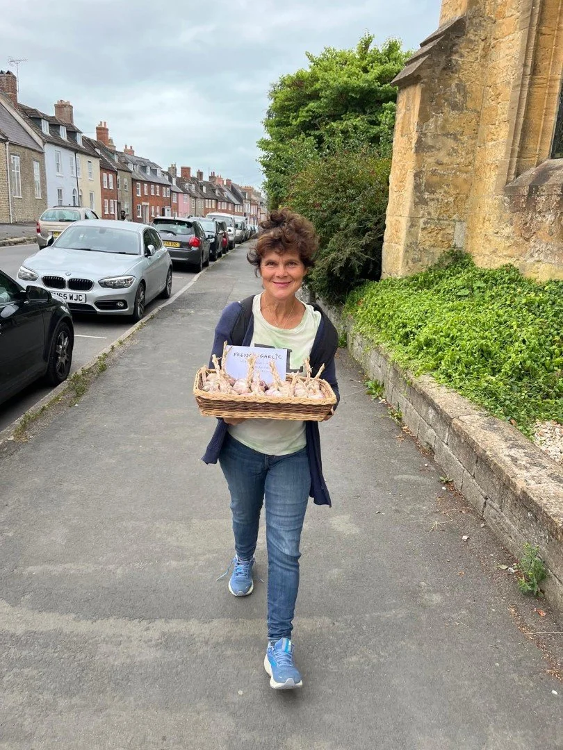 Lucy taking garlic to market