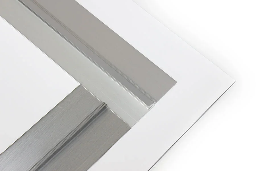 Close-up of a corner of a acrylic frame with a metal backing