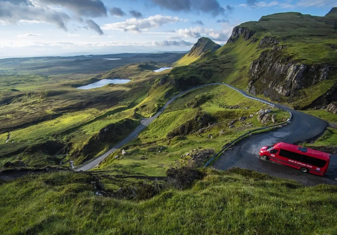The Wee Red Bus on the dramatic Quiraing mountain pass