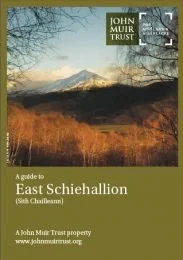Cover of a guidebook titled 'A guide to East Scheihallion' by John Muir Trust, featuring a landscape with mountains and a grassy field.