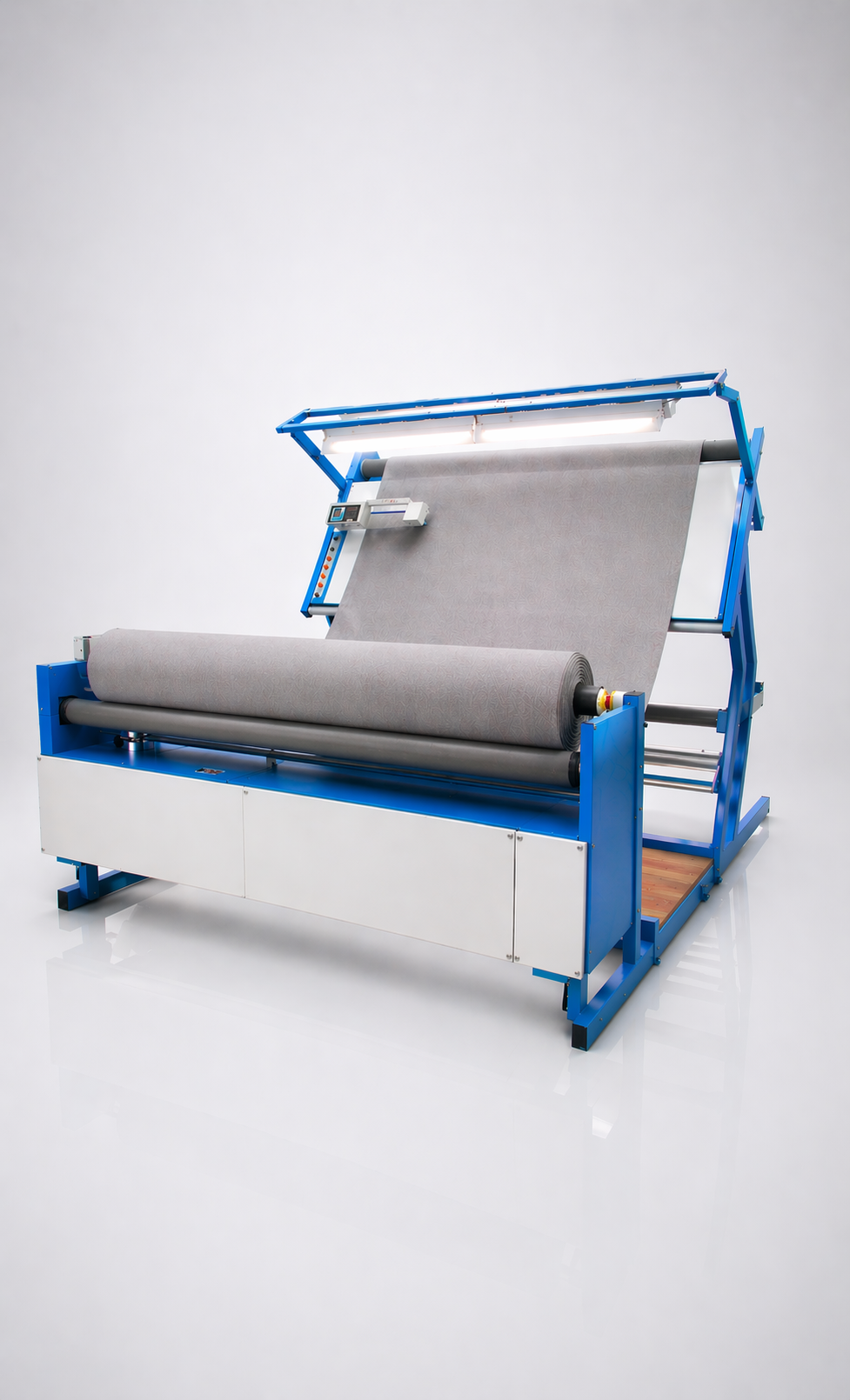 A textile rolling machine with grey fabric for roll to roll inspection and QC of cloth