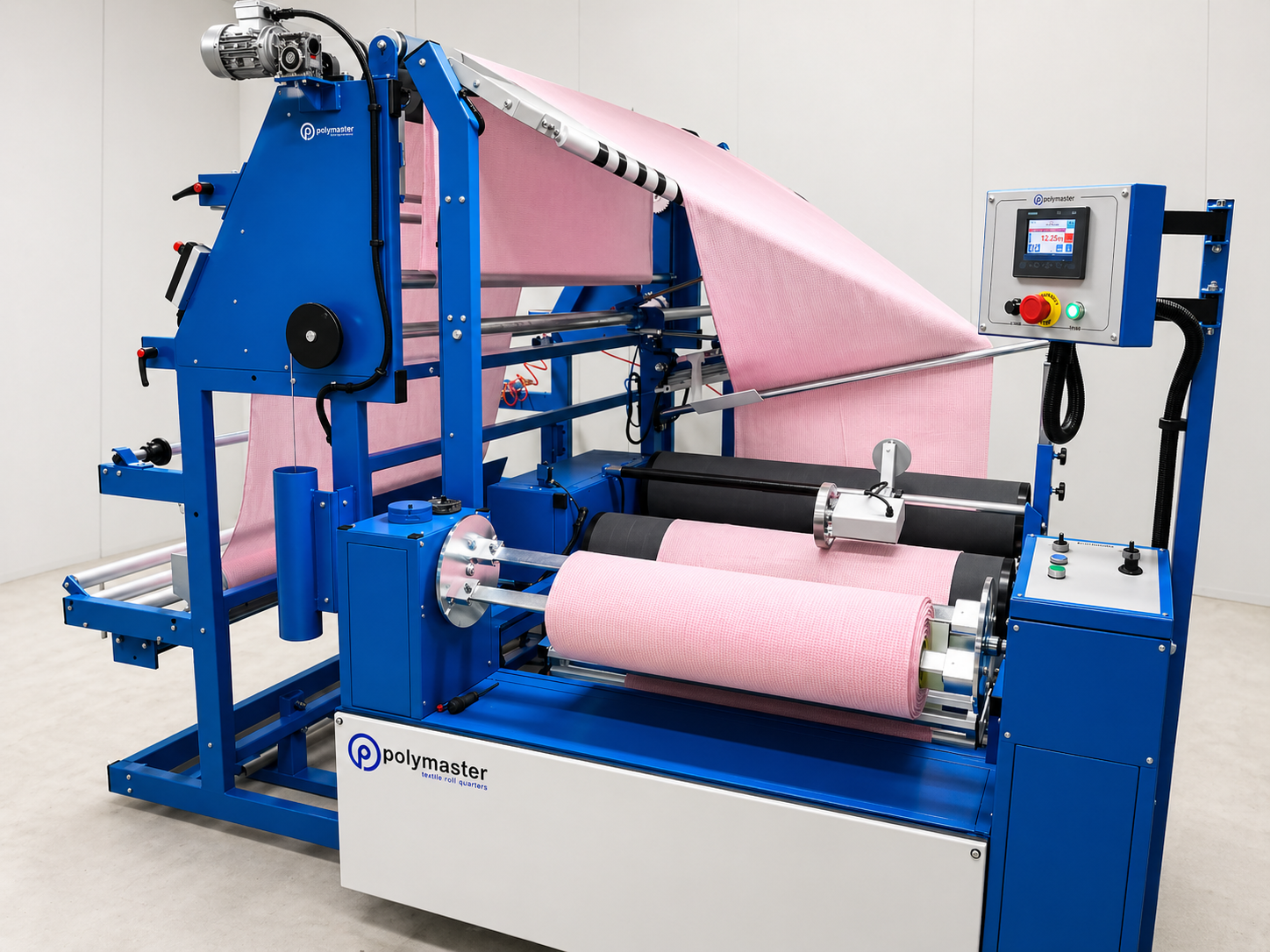 Textile folding machine with pink fabric roll and a digital control panel.