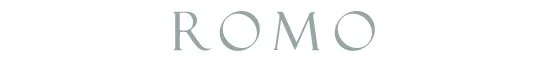 Minimalist logo with the word 'ROMO' in light gray letters on a white background.