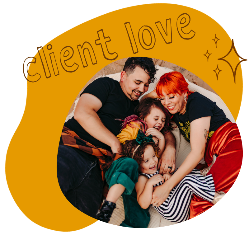 client love: a very joful image of a family cuddled up on the ground with dad tickling one of his daughters and mom mirroring him while tickling her other daughter