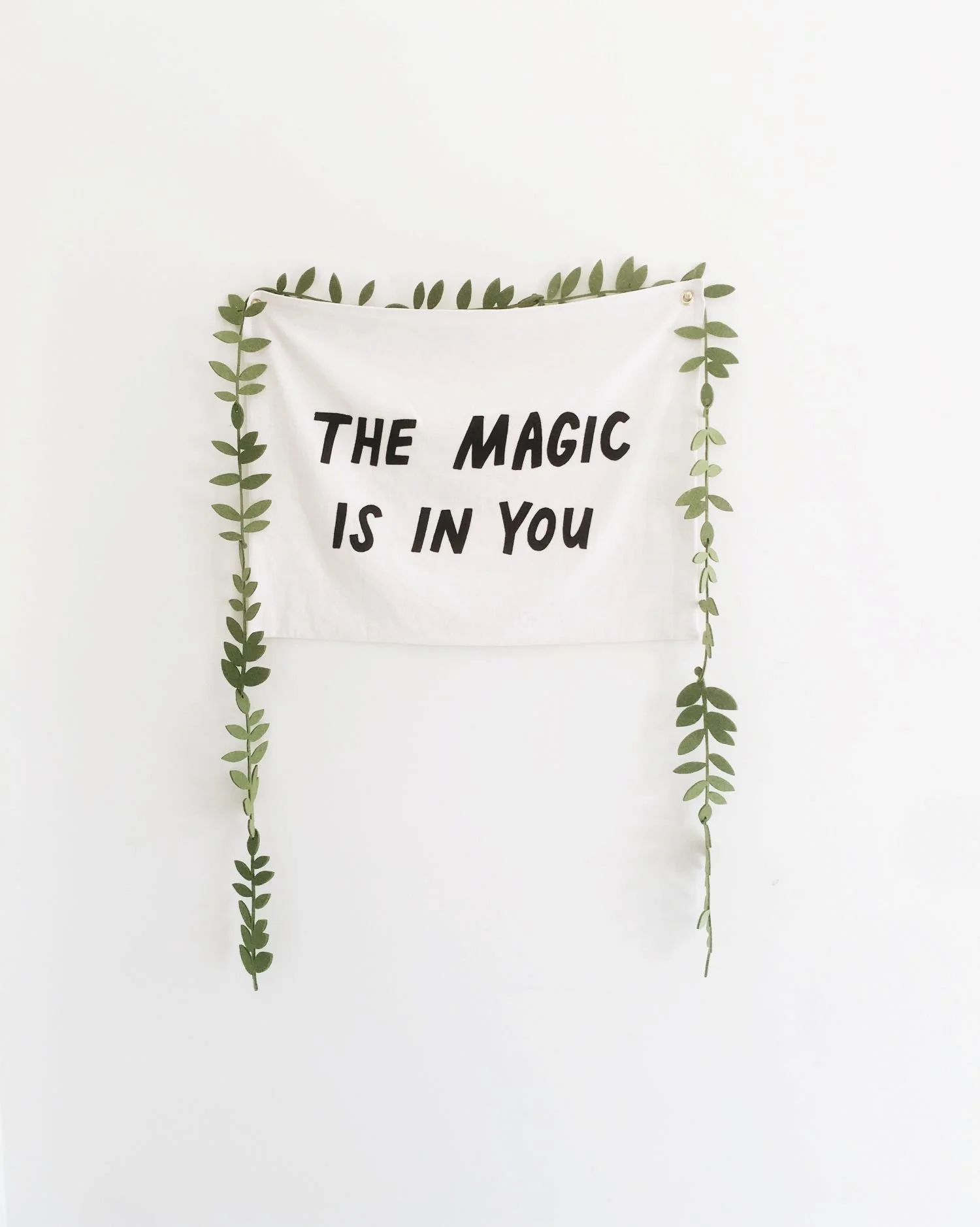 Billede af tekst: "The magic is in you".
