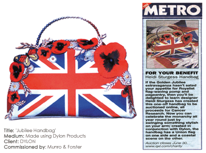 A handbag designed with a Union Jack pattern, decorated with red poppy flowers and ribbons, alongside a magazine cover titled "METRO" featuring an image of the handbag and a short article.