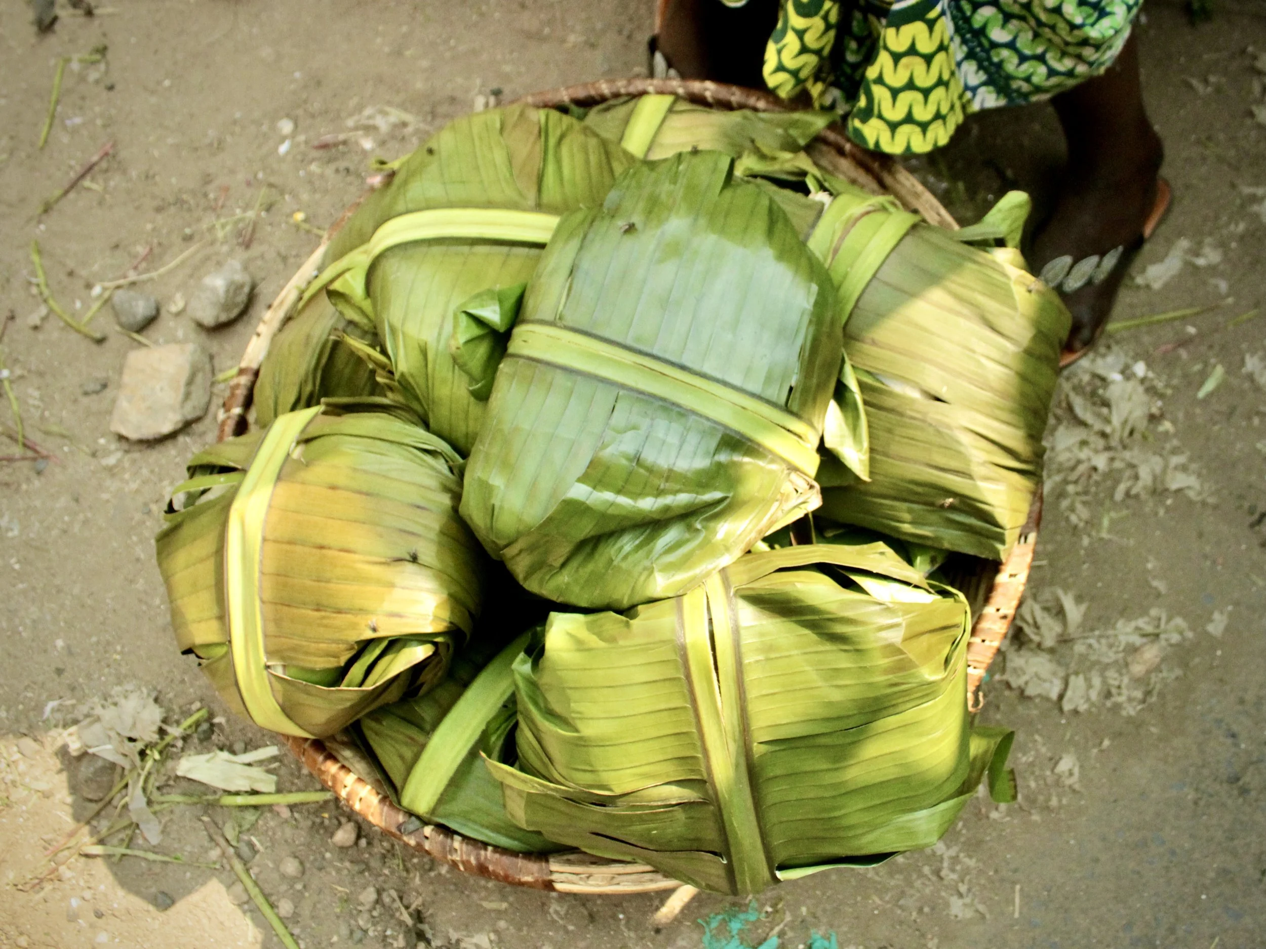 Bundles of uburobe, a cassava bread wrapped in banana leaves and sold throughout Burundi. Sales of the staple food had declined sharply as household incomes fell and customers struggled to afford basic necessities.