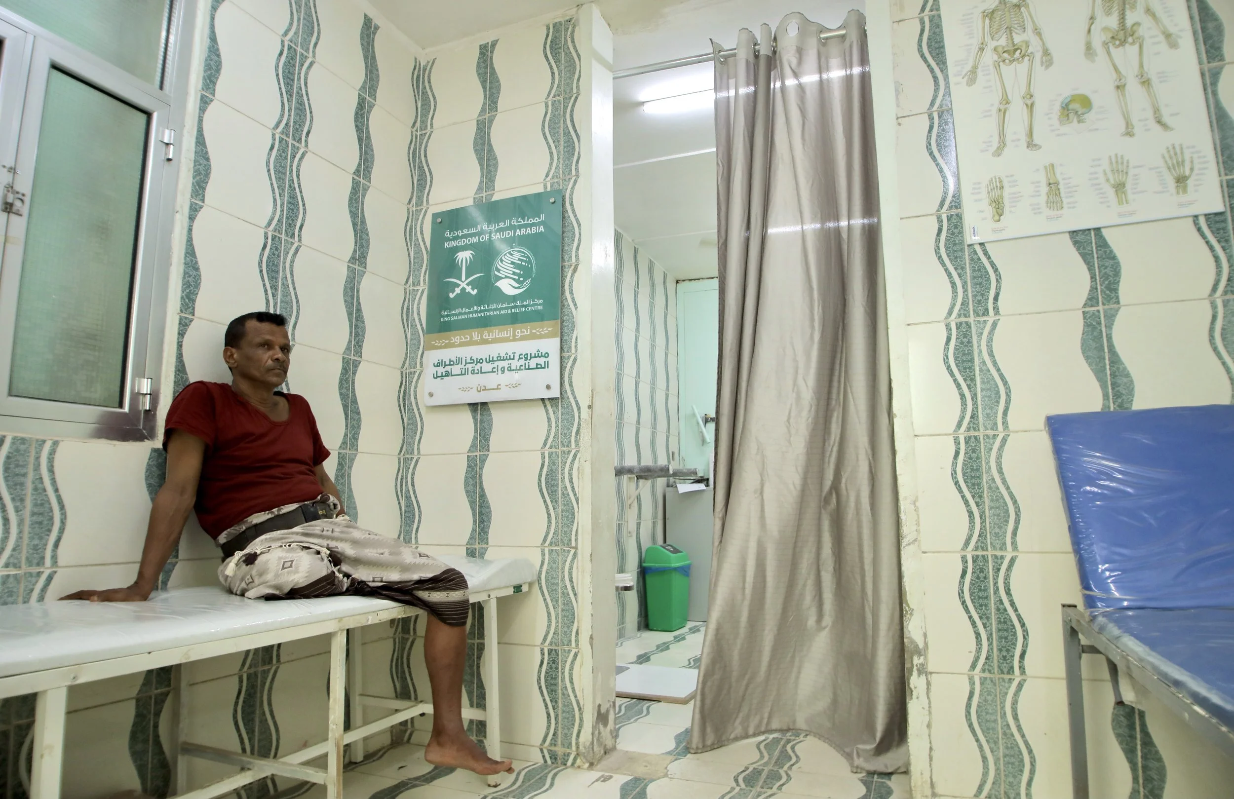 A patient waits inside the Artificial Limbs and Rehabilitation Centre in Aden, Yemen. Around 88 percent of beneficiaries receiving treatment at the centre were injured during the conflict, most of them survivors of landmine accidents or unexploded or