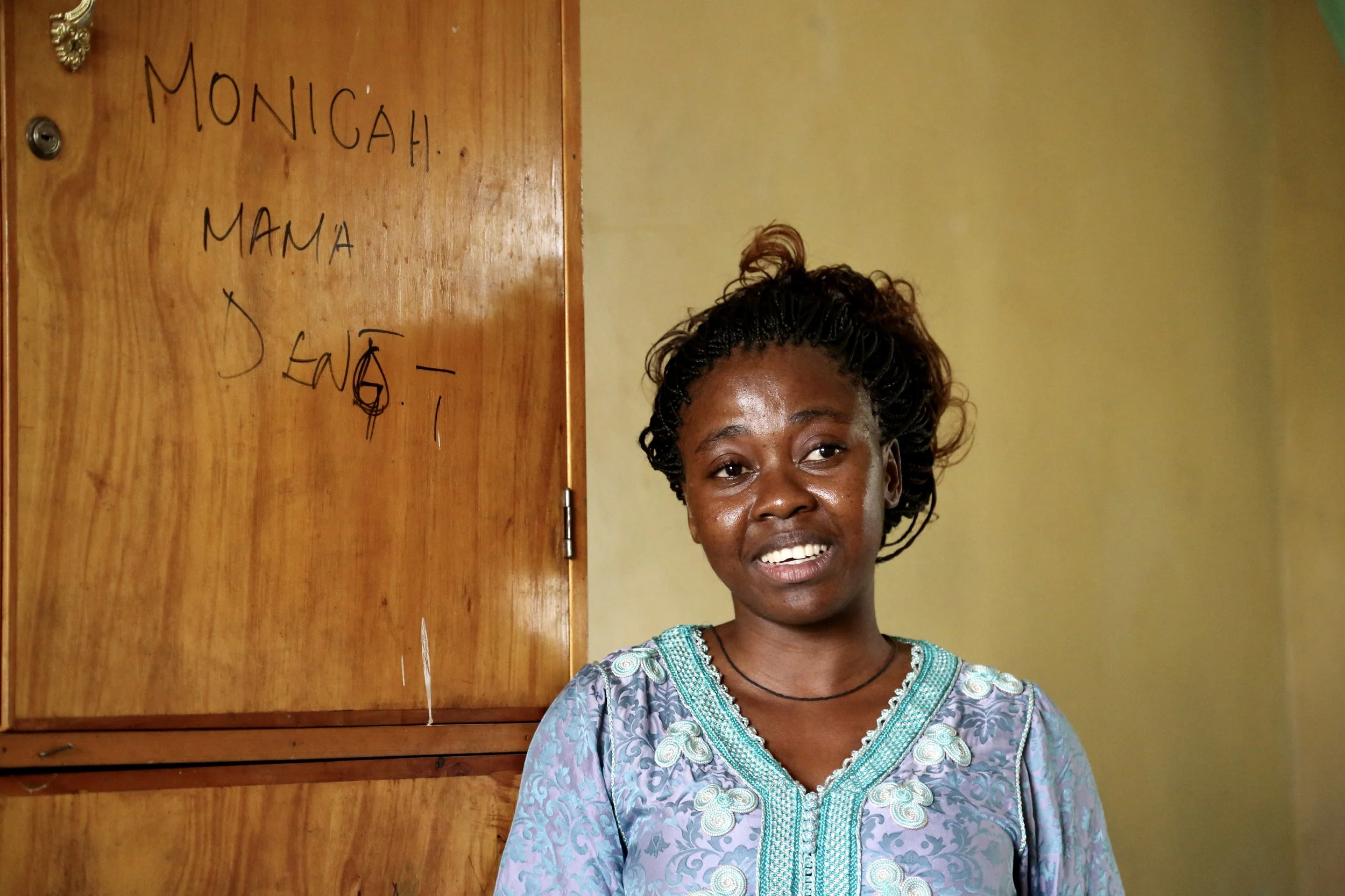 Marie Angel Kashindi, a young refugee from the DRC, poses inside her room at the Safe Haven in Kakuma refugee camp before learning whether she would be approved for relocation. For months, like many refugees, she lived between uncertainty and hope.