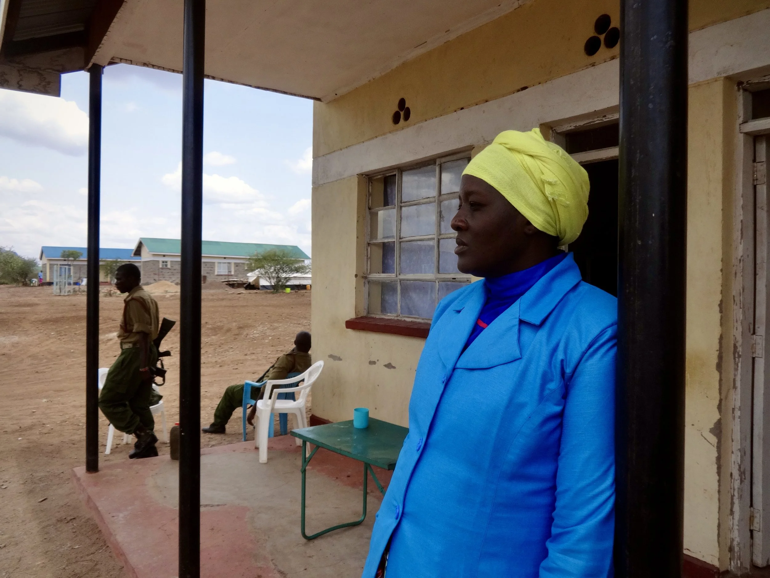 A protection officer from the Lutheran World Federation stands outside the Nadapal reception centre. The facility, where asylum seekers are normally registered, housed and given initial assistance before transfer to Kakuma, remained largely empty dur