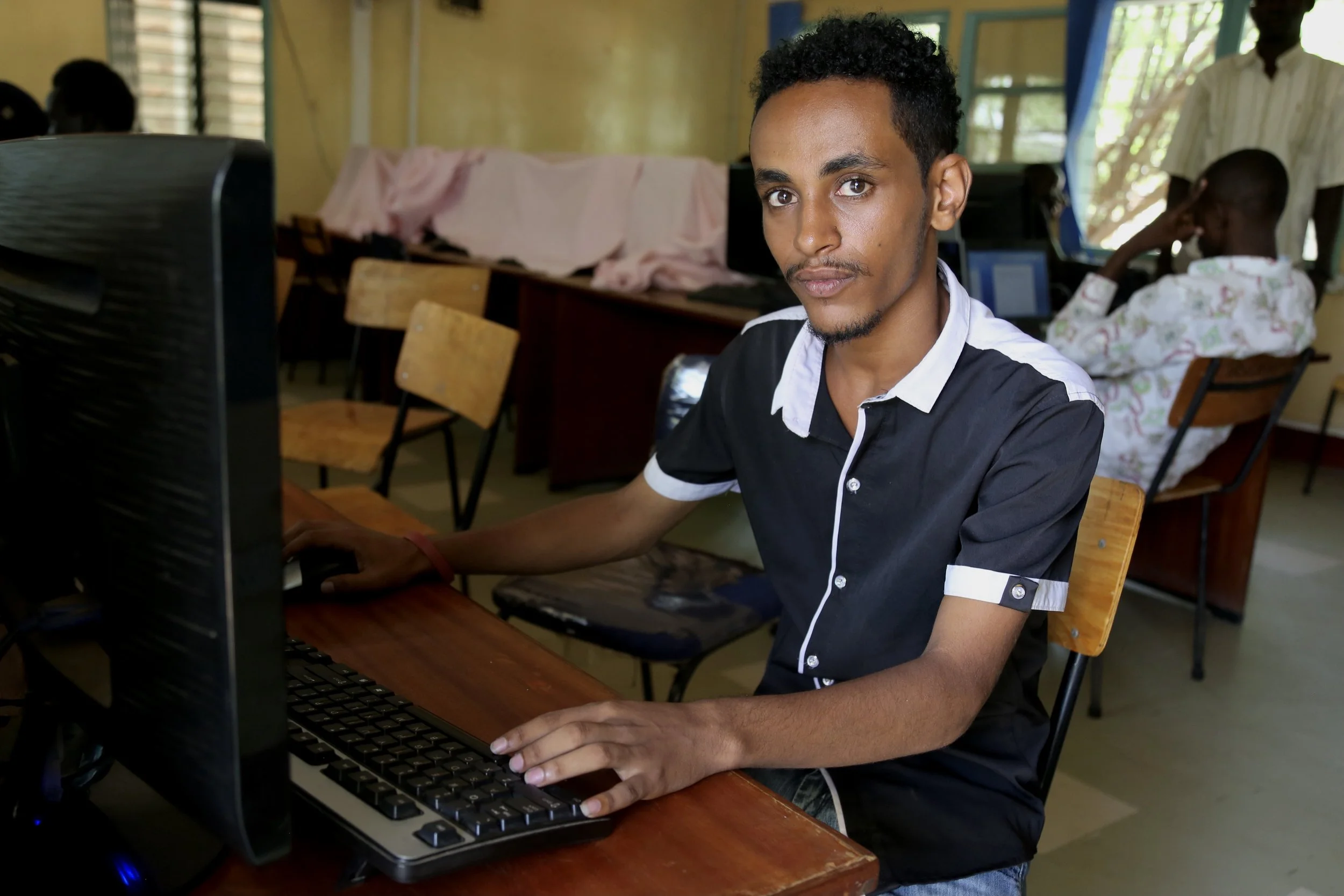 Nazrit Tesfaye studies in Kakuma refugee camp. Education became both ambition and obligation: he hoped qualifications could help change his family’s future.