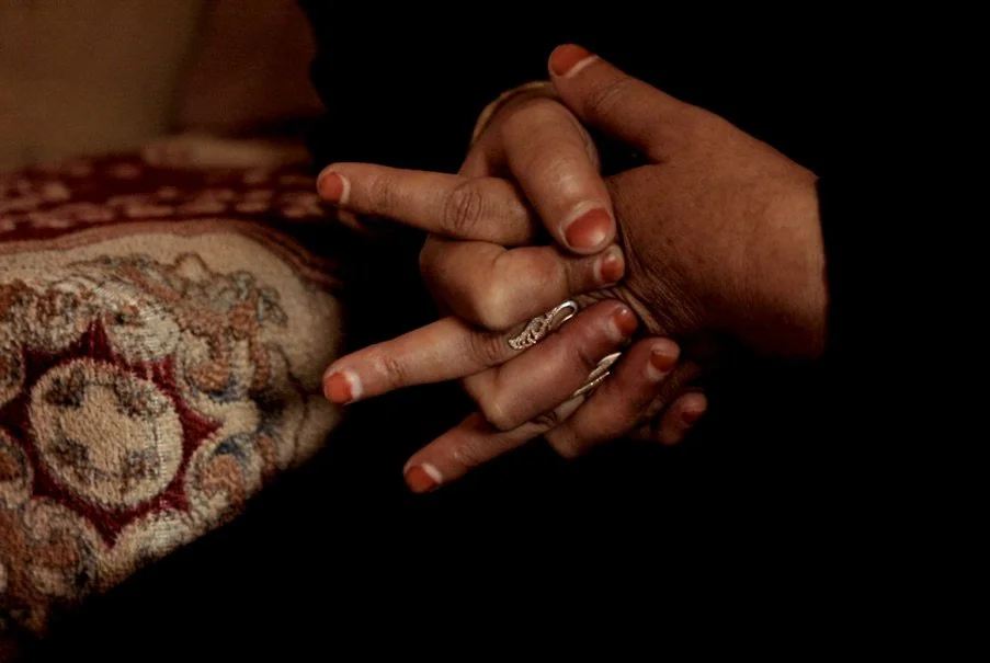 Dalila Abdo Ahmed clasps her hands inside her family’s apartment in Taiz. The young woman said she has told her story several times, but it doesn’t seem to bring any help.