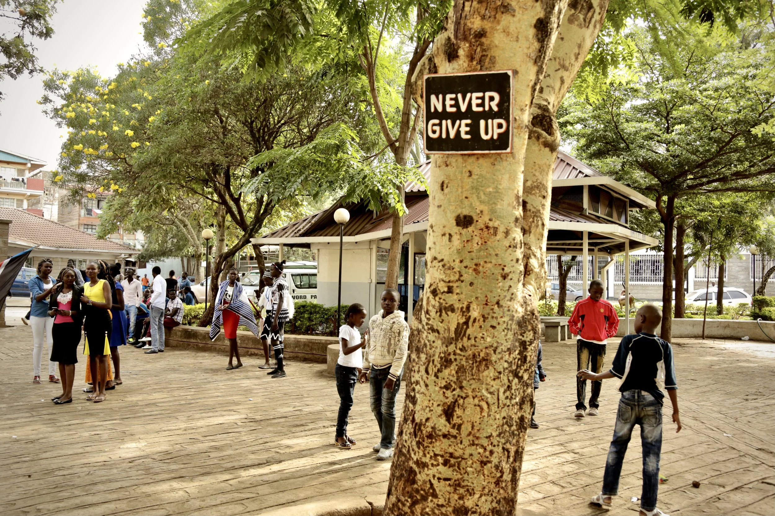 Refugees and guests gather outside Divine Word Church in Nairobi's Kayole estate during celebrations marking World Refugee Day, organised by the Kenya Conference of Catholic Bishops (KCCB) and Jesuit Refugee Service (JRS).