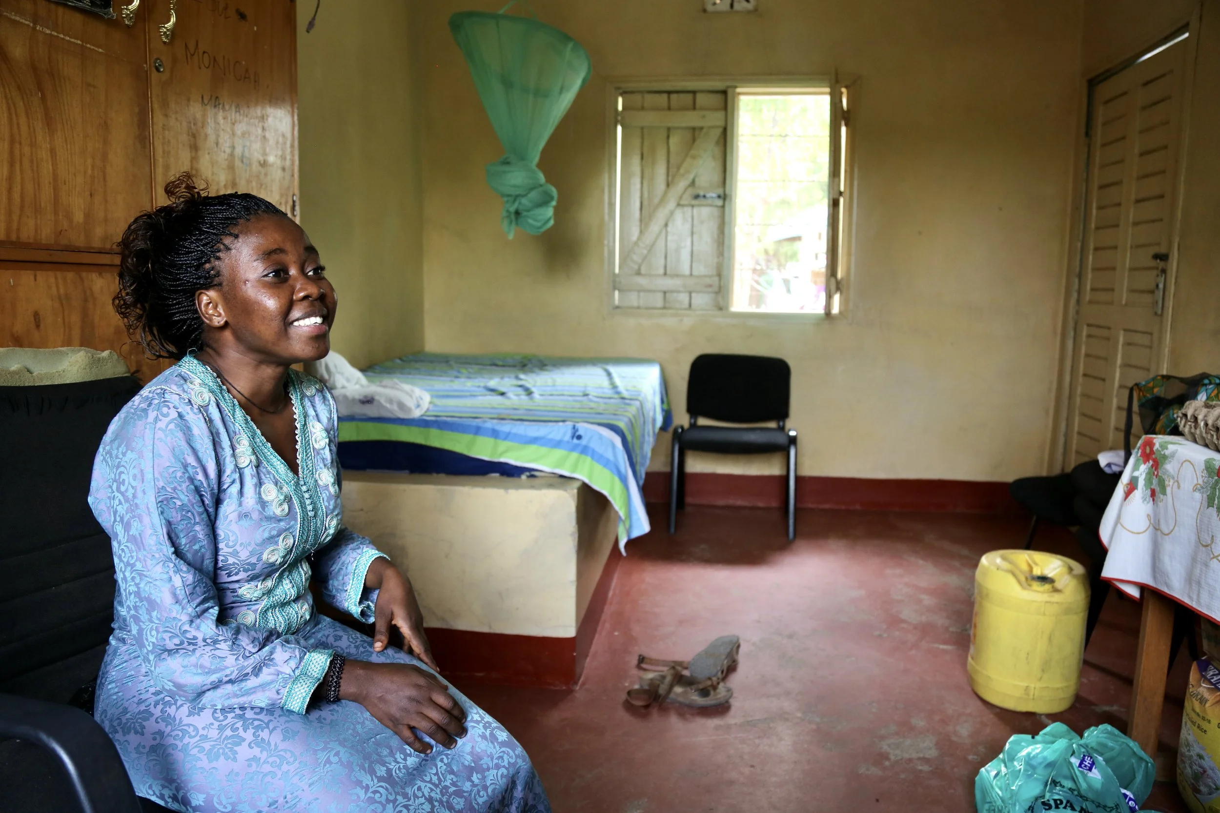 Marie Angel sits inside her room at the Safe Haven in Kakuma refugee camp, where women at risk could find temporary protection while waiting for decisions that might change their lives.