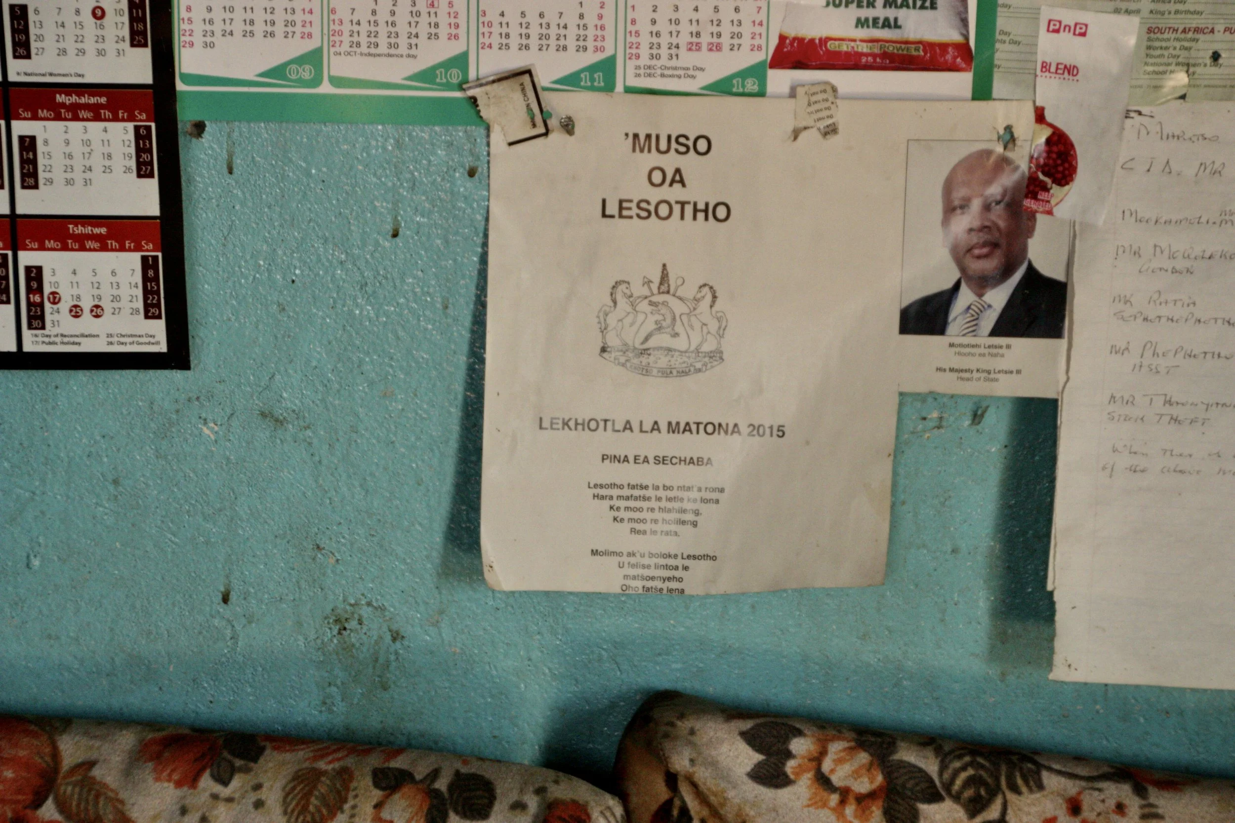 Calendars and community notices hang on the walls inside Michael’s home in Leribe District, Lesotho. Michael says access to education remains one of the most urgent needs for vulnerable children in the area.