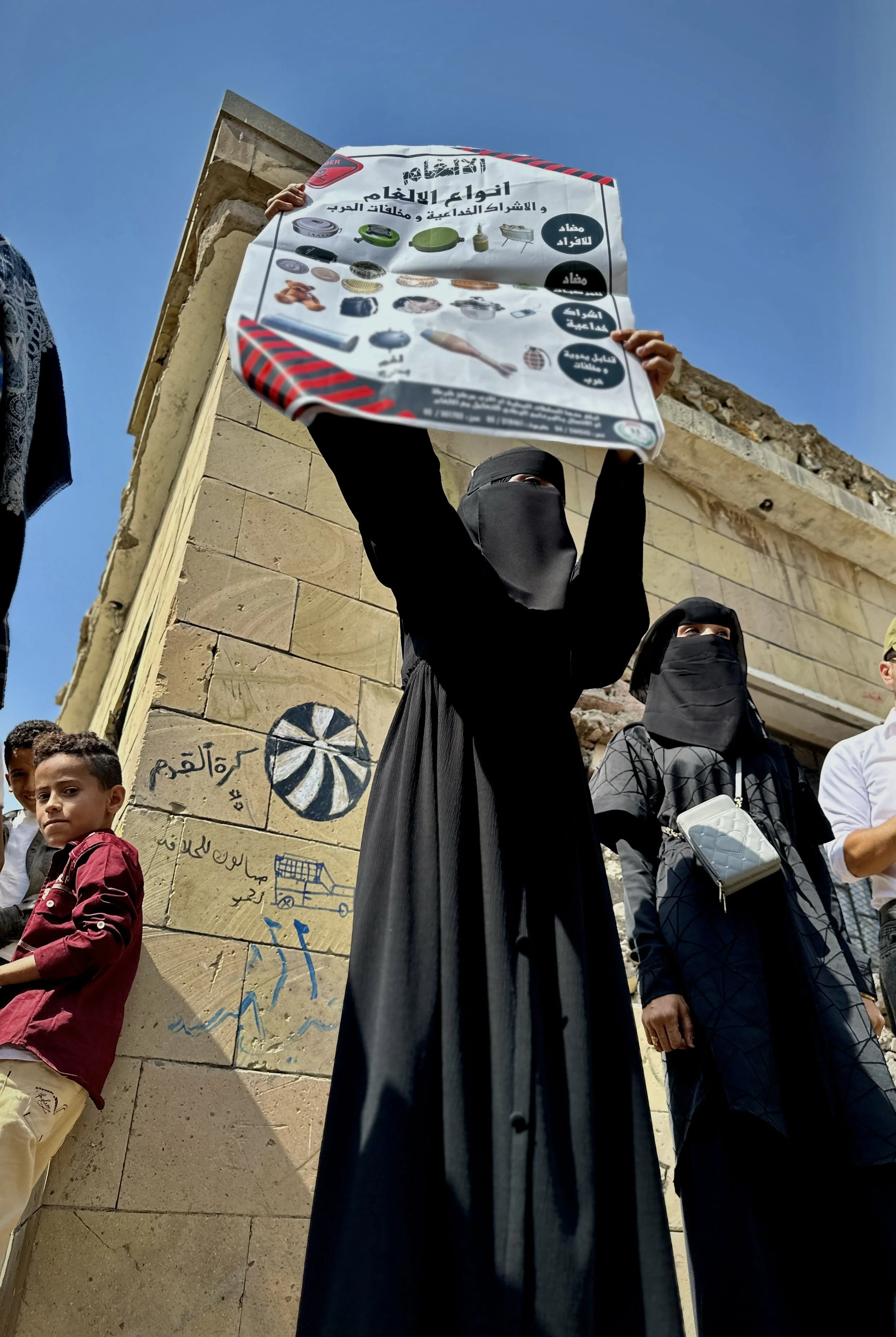 A damaged building stands near a former battleground in western Taiz, Yemen. Clearance teams prioritise roads, schools, homes and public areas affected by explosive contamination to allow displaced families and residents to return safely.