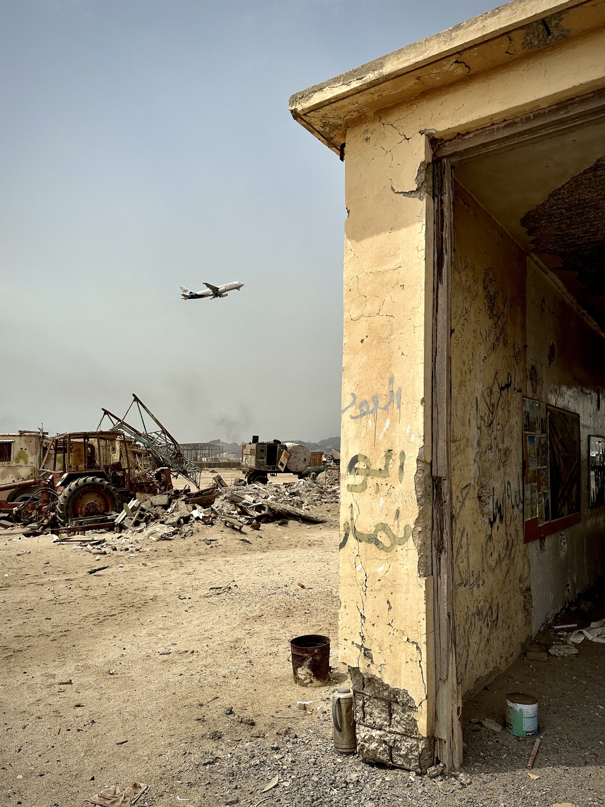 Where Planes Land, War Still Lies Beneath