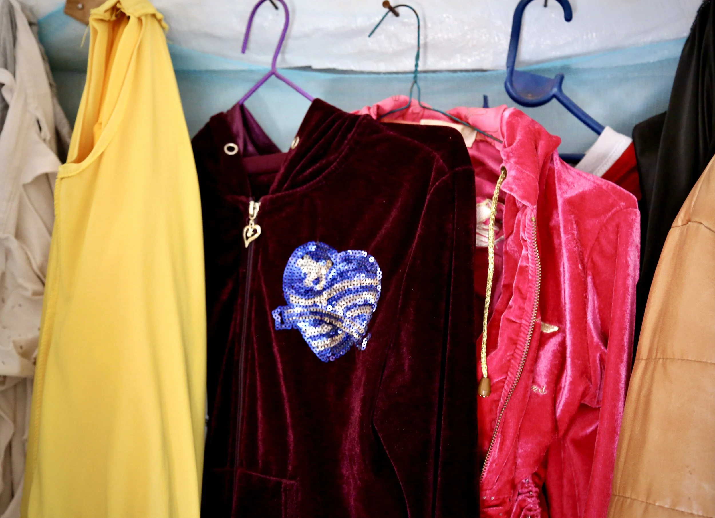 Clothes belonging to Charles Itwara hang inside her shelter in Kakuma refugee camp.