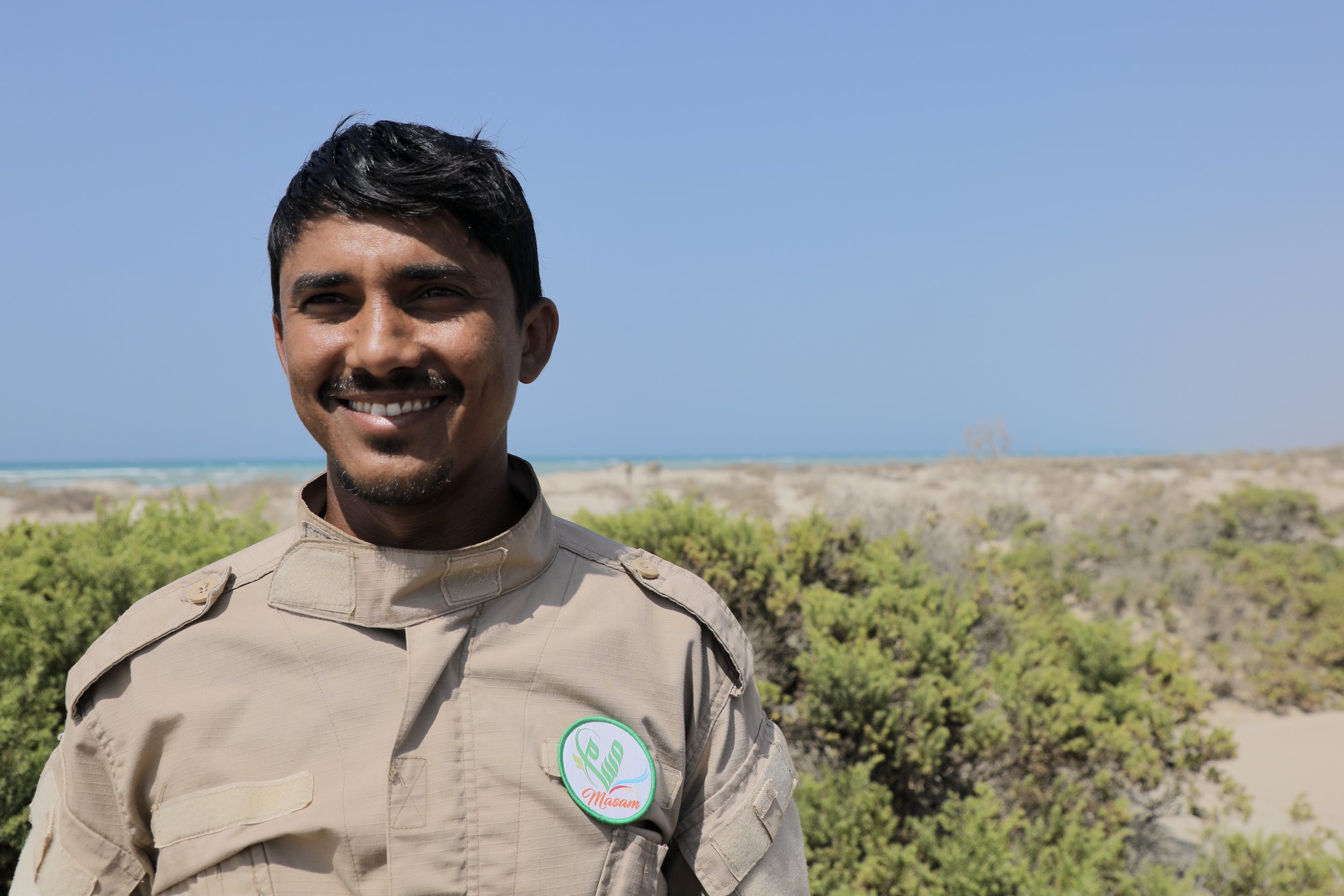 Sami Haimed, Team Leader of Team 26, pauses during a mandatory rest period near a mine clearance site north of Al Khokha. As team leader, Sami is responsible for the safety and coordination of his deminers, overseeing clearance procedures, equipment 