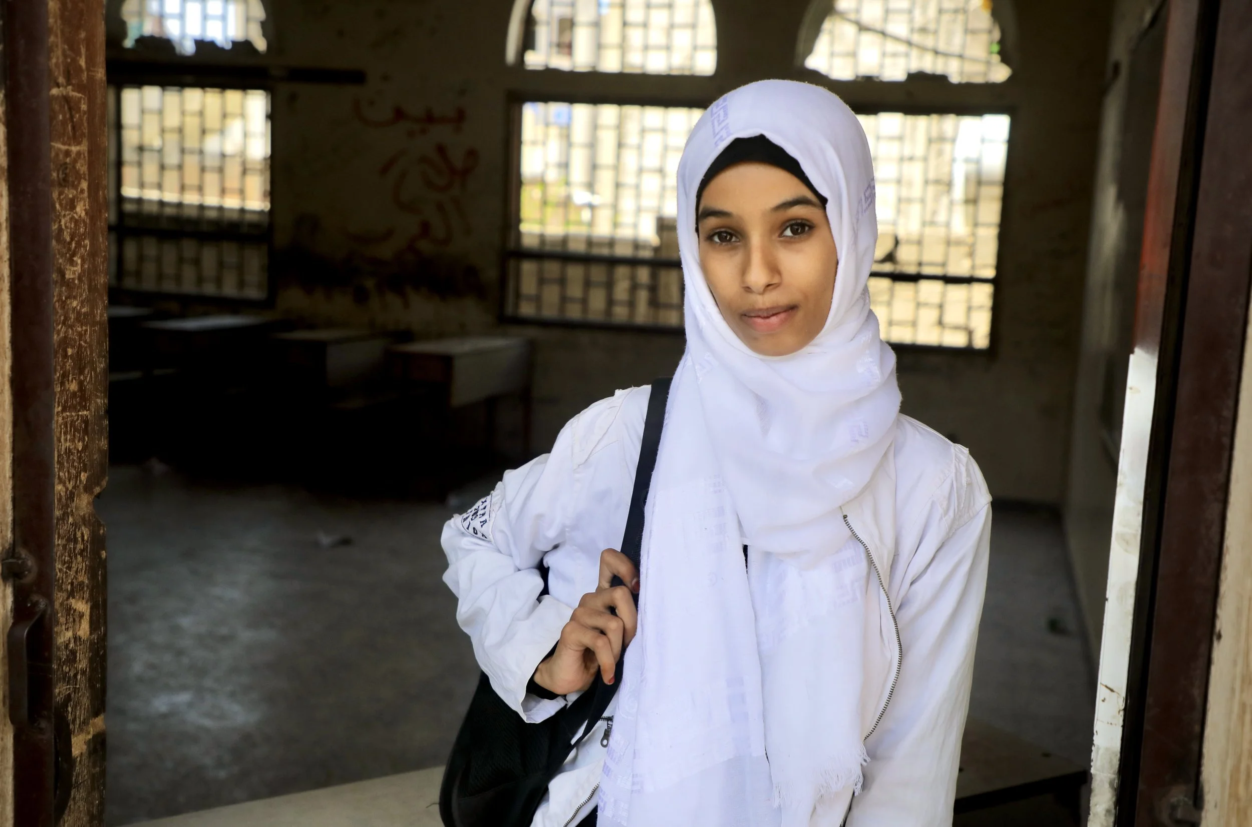 Mariam Fouad, 13, inside a classroom at Ibrahim Aqeel School in Taiz. She now studies in eighth grade after missing years of education because of the war and landmine contamination.