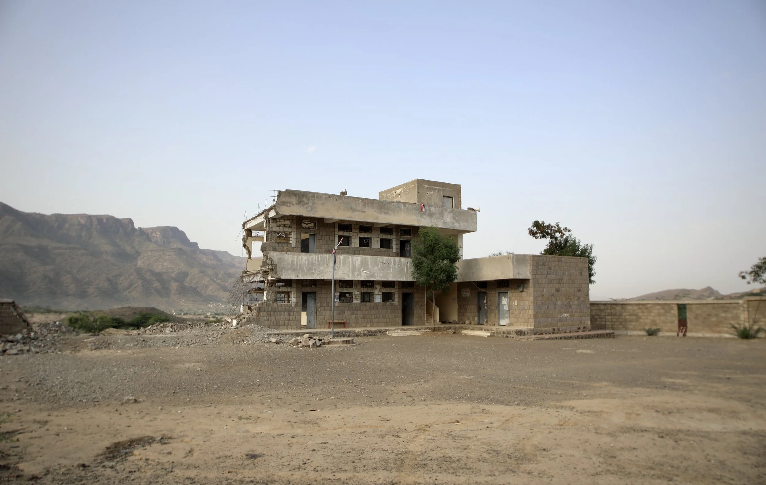 Al Shaab School in Jabal Habashi district, Taiz governorate, Yemen. Parts of the school were destroyed during the conflict after the building was reportedly used for military purposes and the storage of weapons. Years later, sections of the school re
