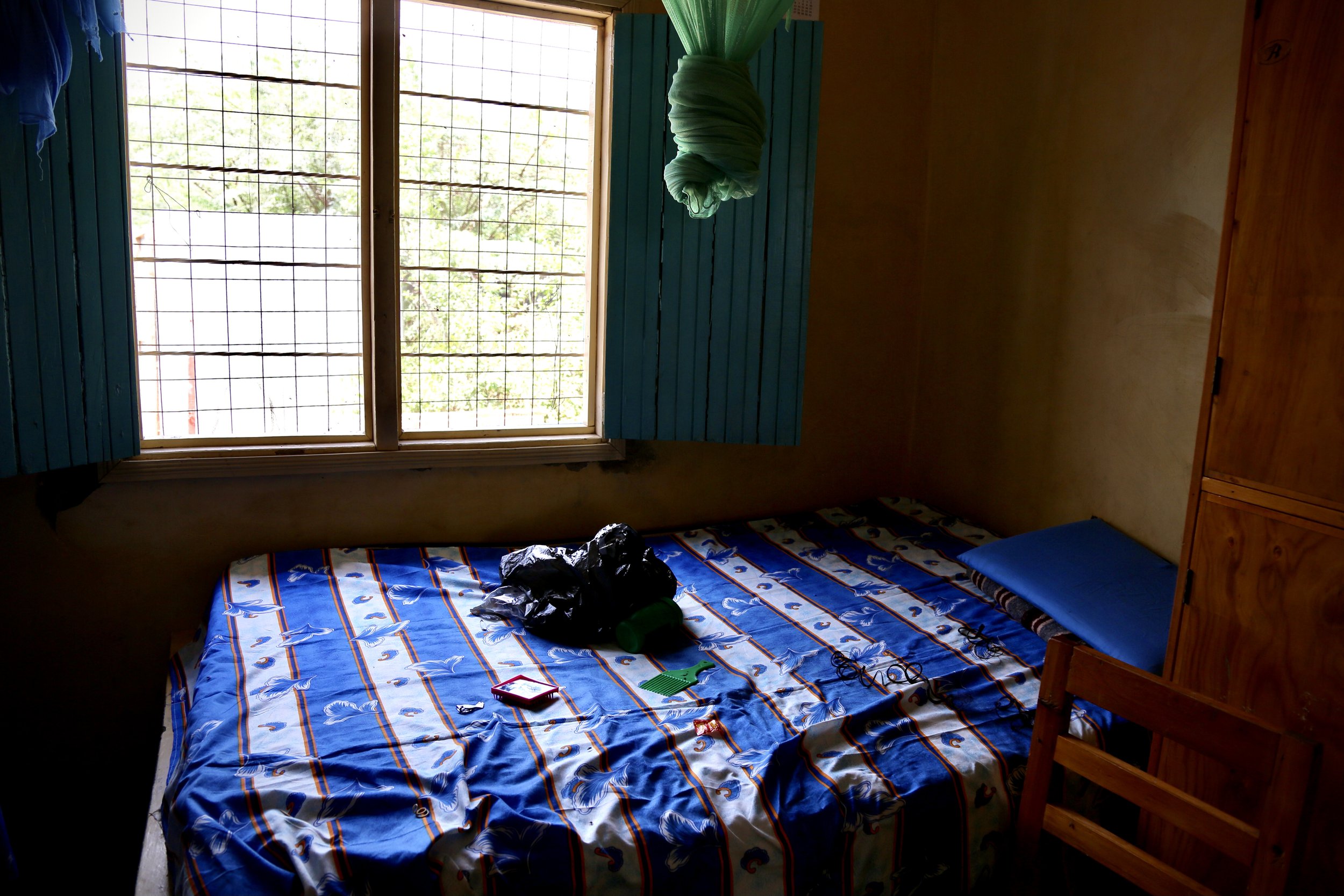 Marie Angel’s room stands empty after her departure from Kakuma. The bed, window and bare walls remain, marked by the absence of someone who had waited there for a future beyond the camp.