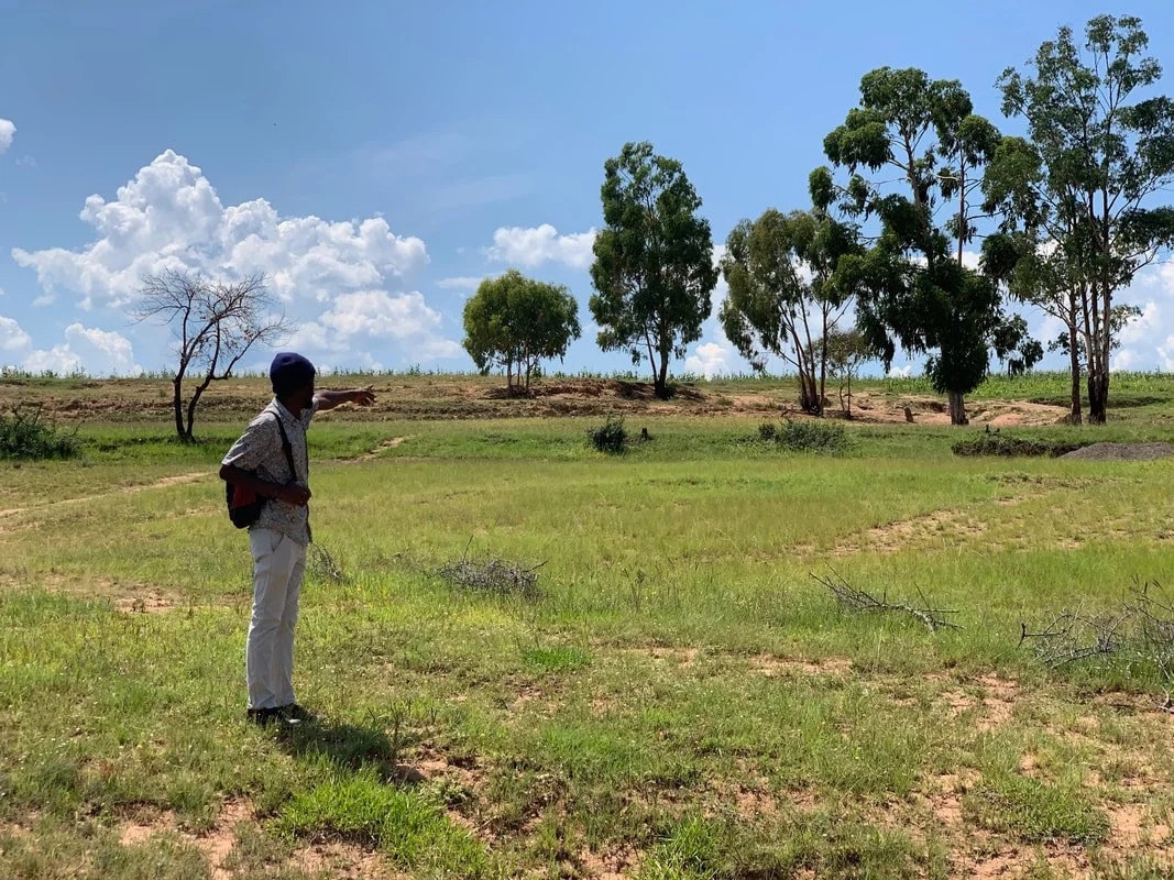 Peer educator D. stands in grazing land in Leribe district, Lesotho. Mobility, isolation and limited access to healthcare place many herd boys at increased risk of HIV and other sexually transmitted infections.
