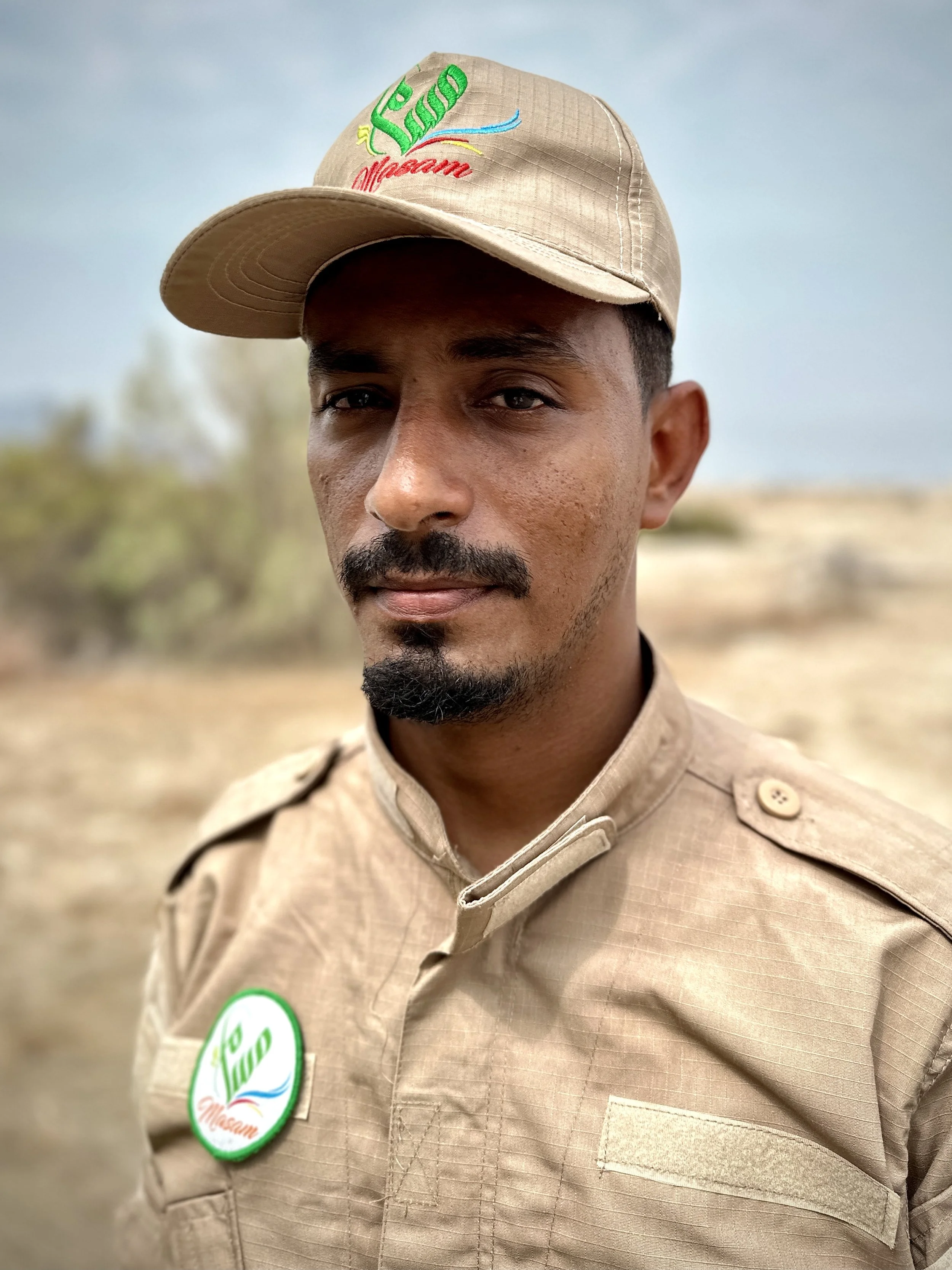 Project Masam Team 24 Leader Jalal Ama'abd Amer stands at Aden International Airport, where deminers continue clearing landmines and unexploded ordnance from ground contested during the 2015 battle for the city. Teams say the airport’s mixed terrain 