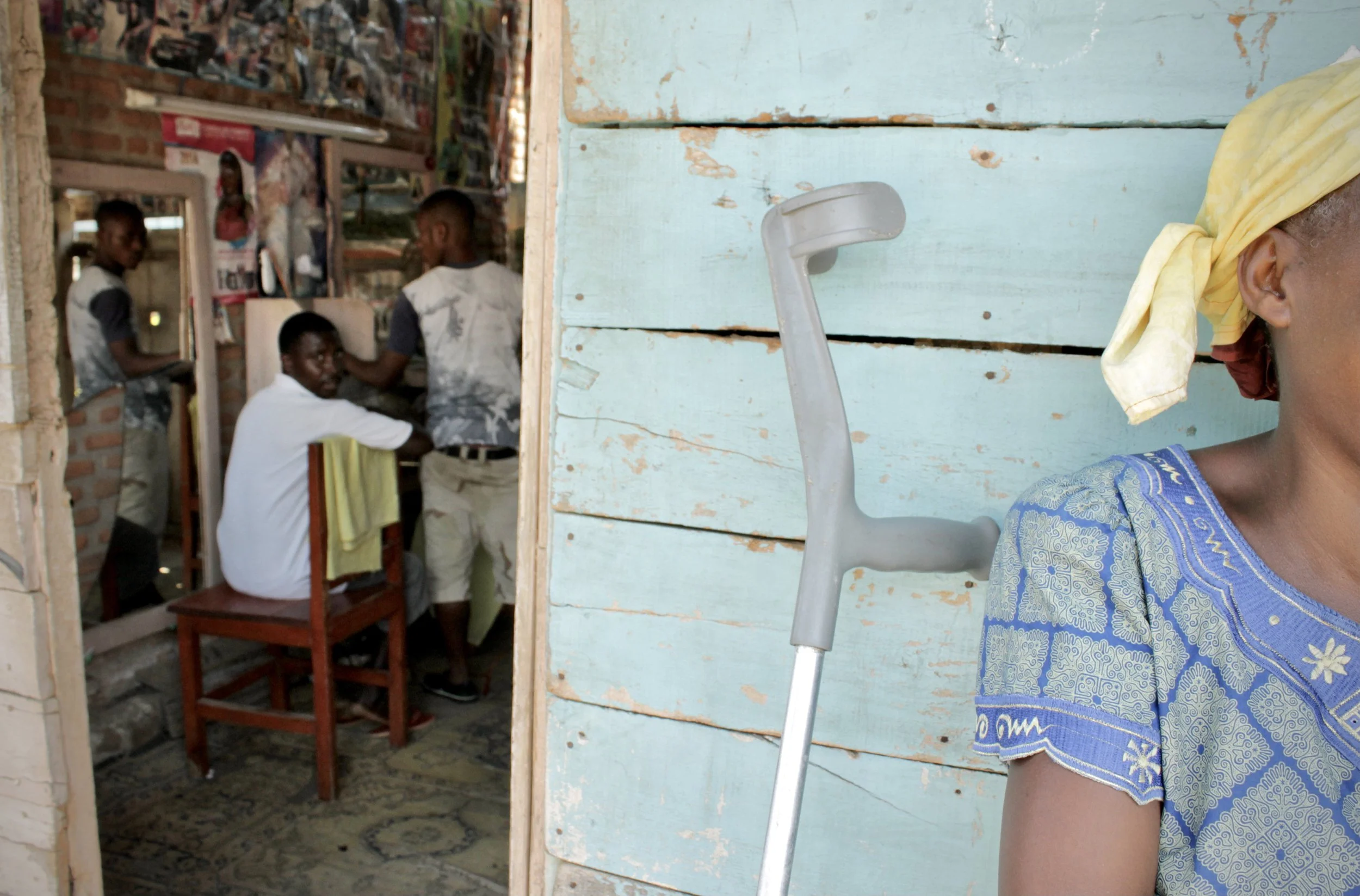 A crutch leans beside I.N. outside a safe location where she was living following the shooting. Friends and relatives helped shelter her family after she fled her home in Mutakura.