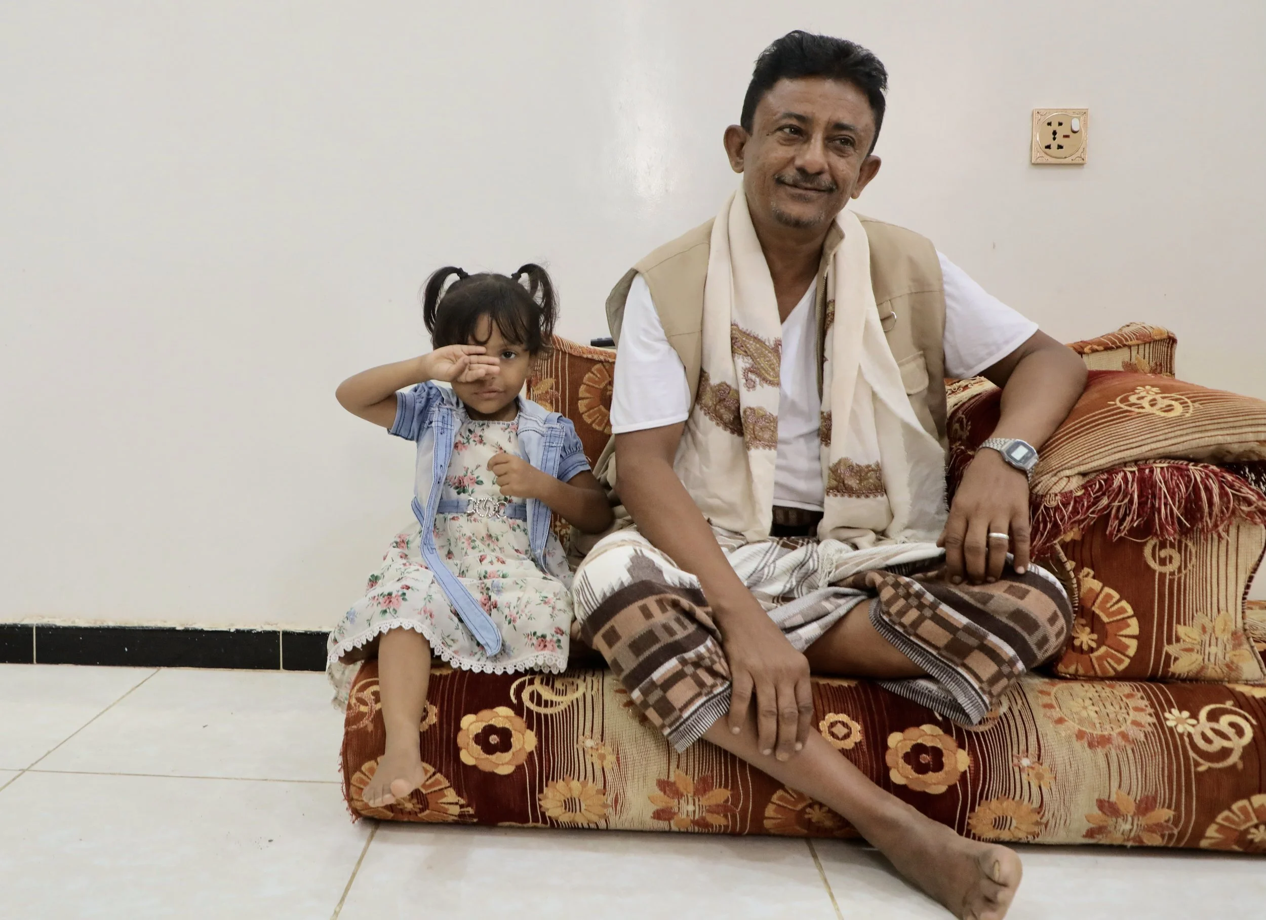 Saeed Omar Haimed was the first deminer in his family and a hero to his sons who decided to follow in his footsteps once the war broke in Yemen in 2015. Here with granddaughter Shmock.