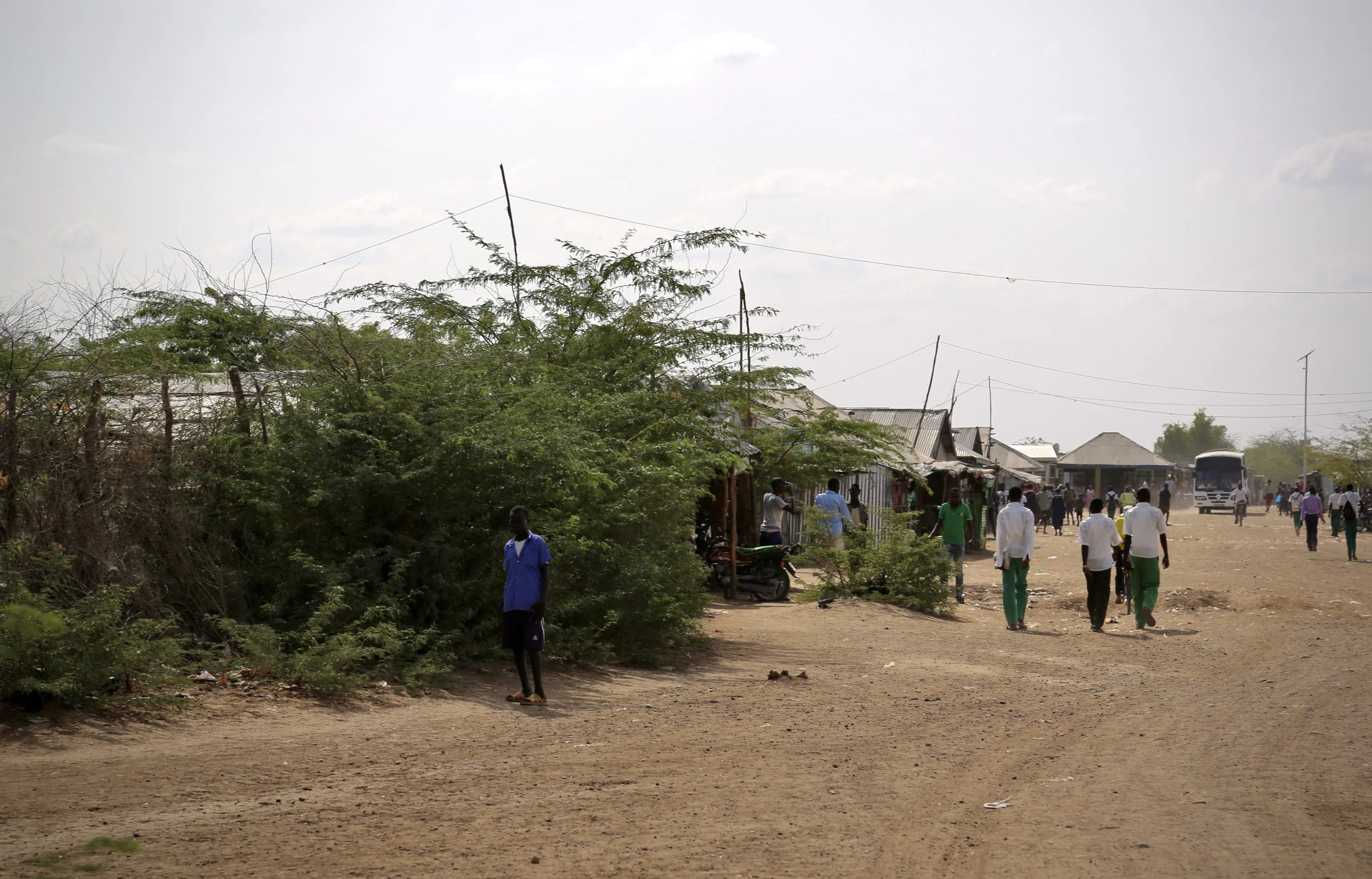 A road leading into Kakuma refugee camp in northwestern Kenya, where LGBTQ+ refugees from Uganda and across East Africa sought safety after fleeing persecution, violence and anti-gay crackdowns at home.