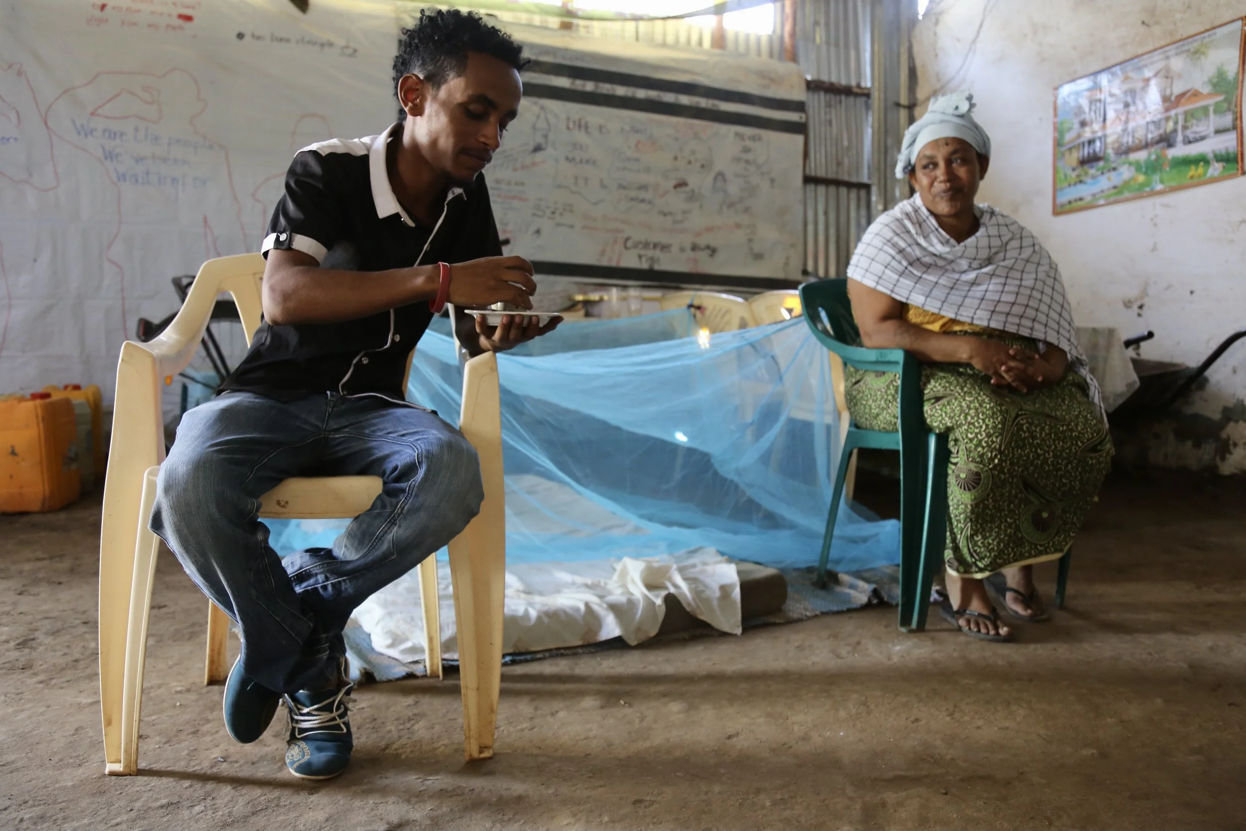 Nazrit sits with his mother in Kakuma. Their family’s journey had crossed war, exile, forced relocation and years of uncertainty.