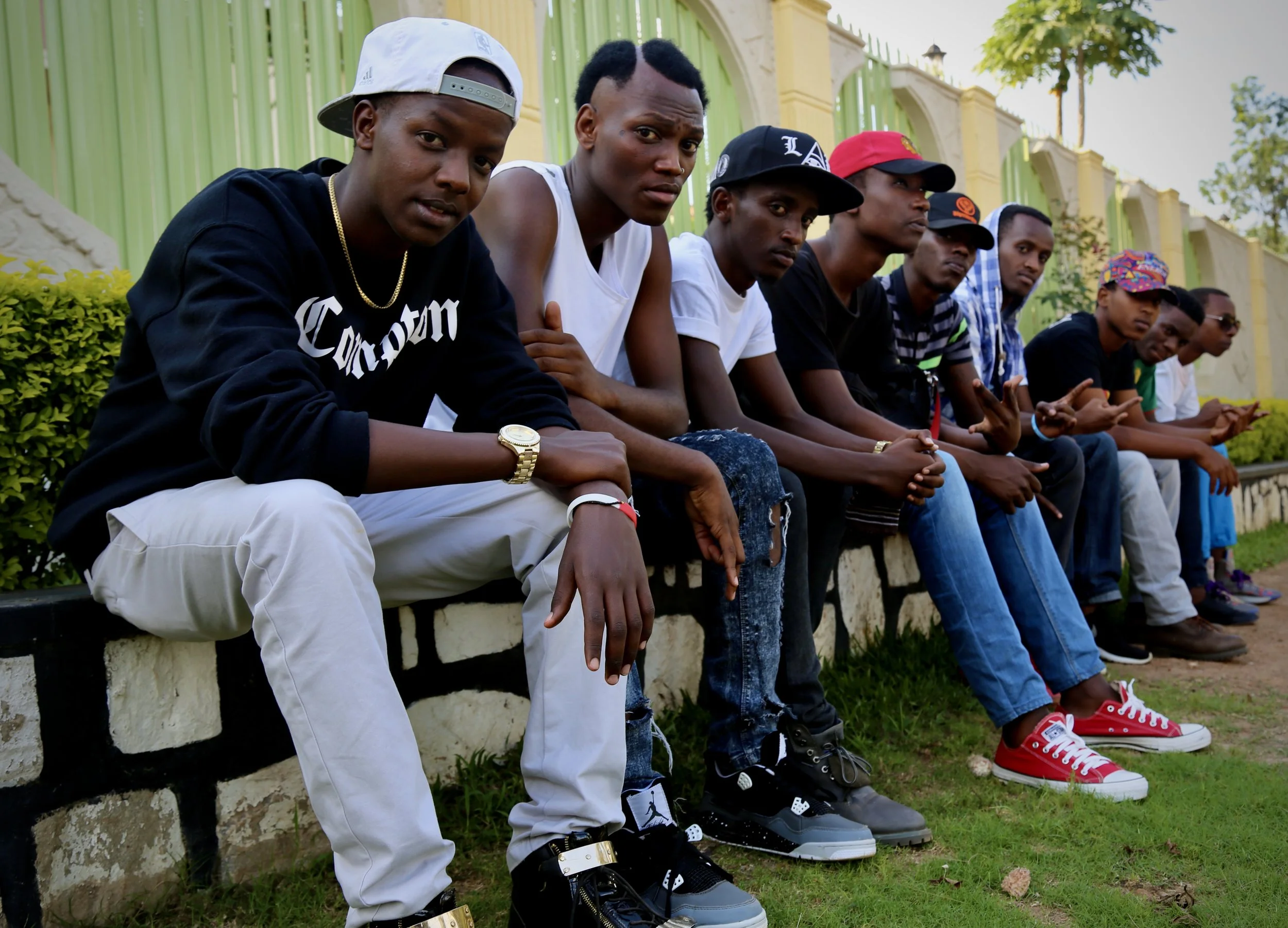Young Burundian refugees gather outside the house in Kigali where many former protesters, students and activists found refuge after fleeing Burundi in 2015.