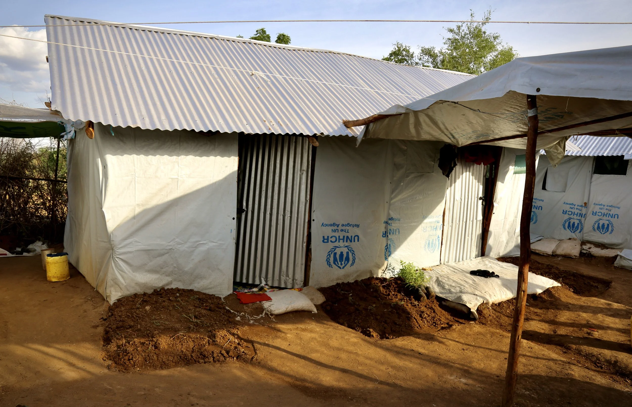 Corrugated metal sheets and thorn branches form part of the perimeter surrounding a section of Kakuma refugee camp where LGBTQ+ refugees clustered together for protection after facing harassment and attacks from other residents. UN officials acknowle