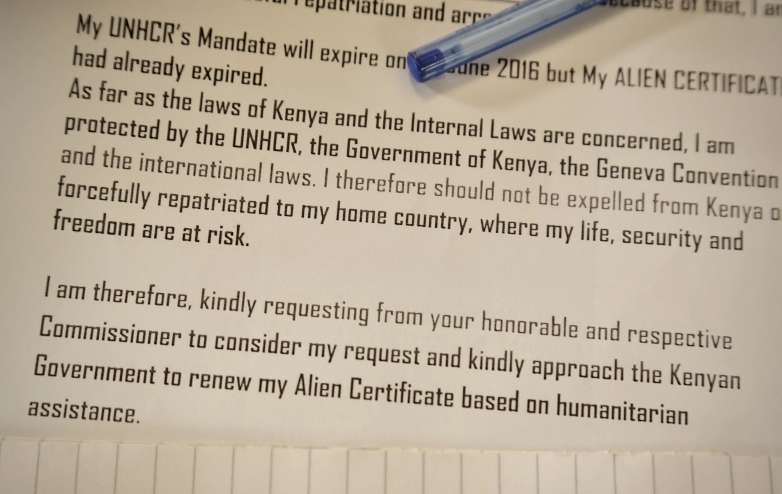 A letter requesting legal protection and documentation lies on a table during a meeting in Nairobi. Refugees said difficulties obtaining or renewing documents left many vulnerable to arrest and harassment. Nairobi, Kenya, June 2016.