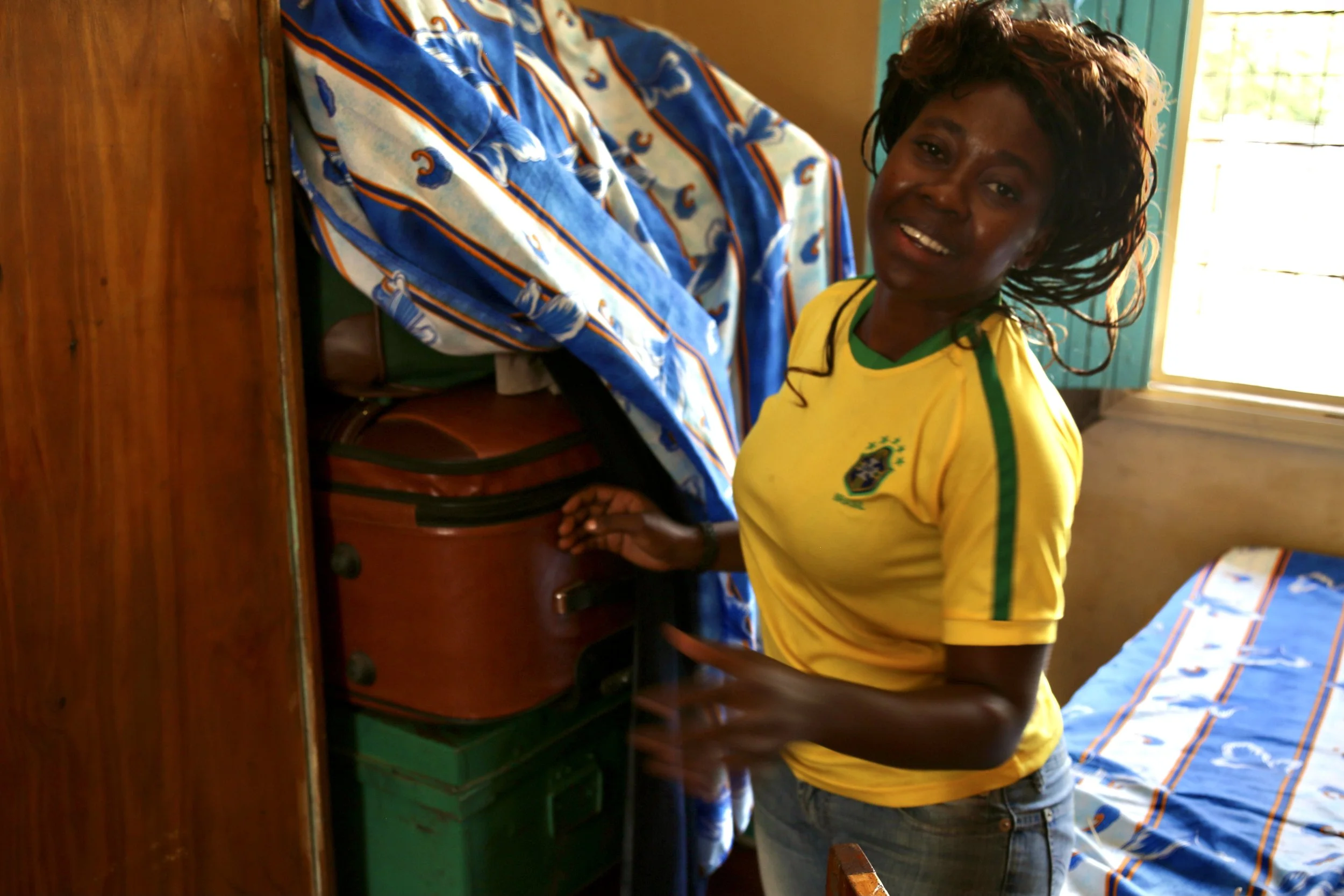 After receiving confirmation of her departure, Marie Angel begins packing her belongings inside the Safe Haven. What had been a room of waiting became, at last, a room of preparation.