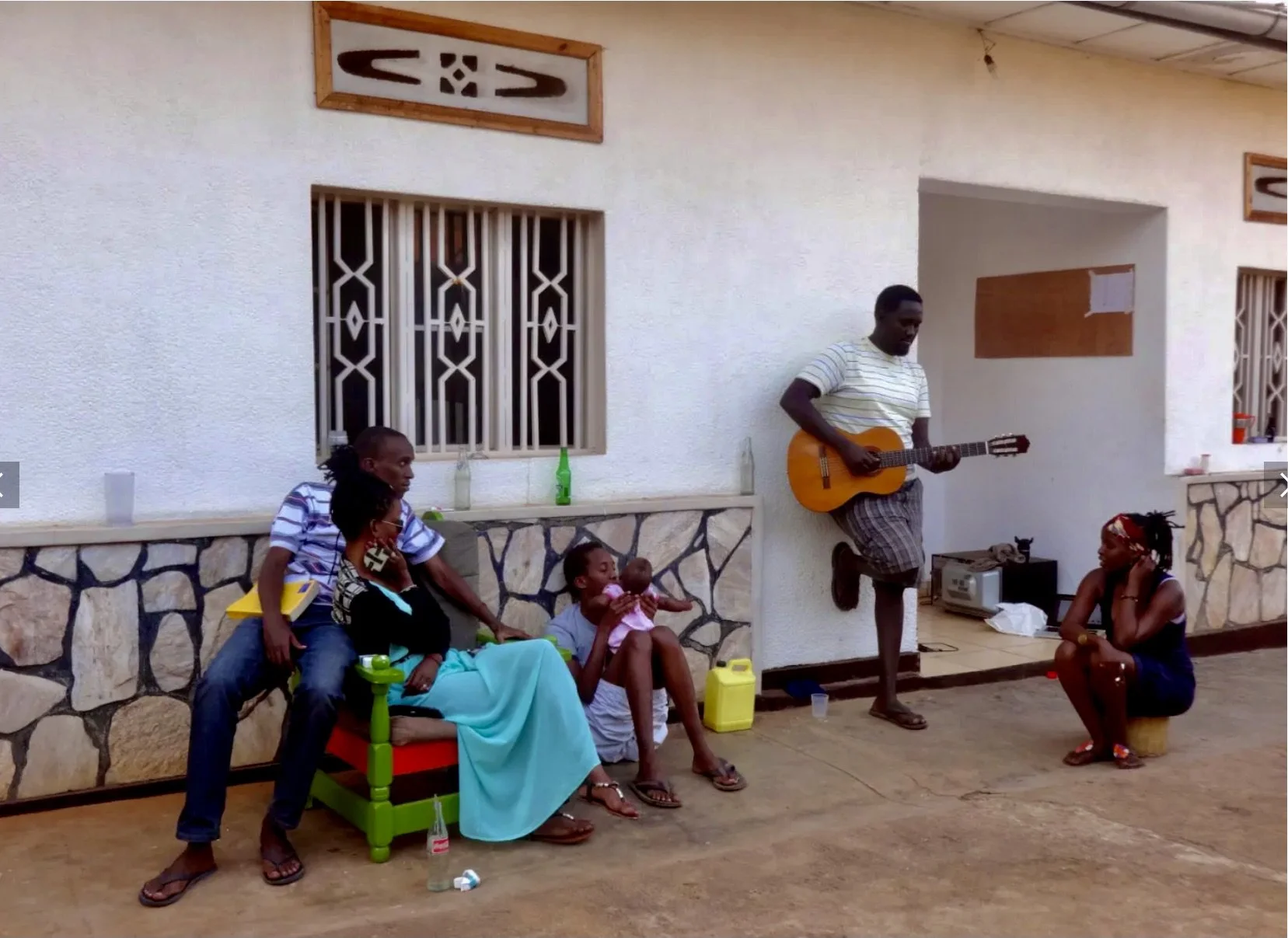 Burundian refugees gather outside the house they shared in Kigali, Rwanda. After fleeing political violence in Burundi following President Pierre Nkurunziza’s controversial third-term bid in 2015, the compound became both a refuge and a social space 