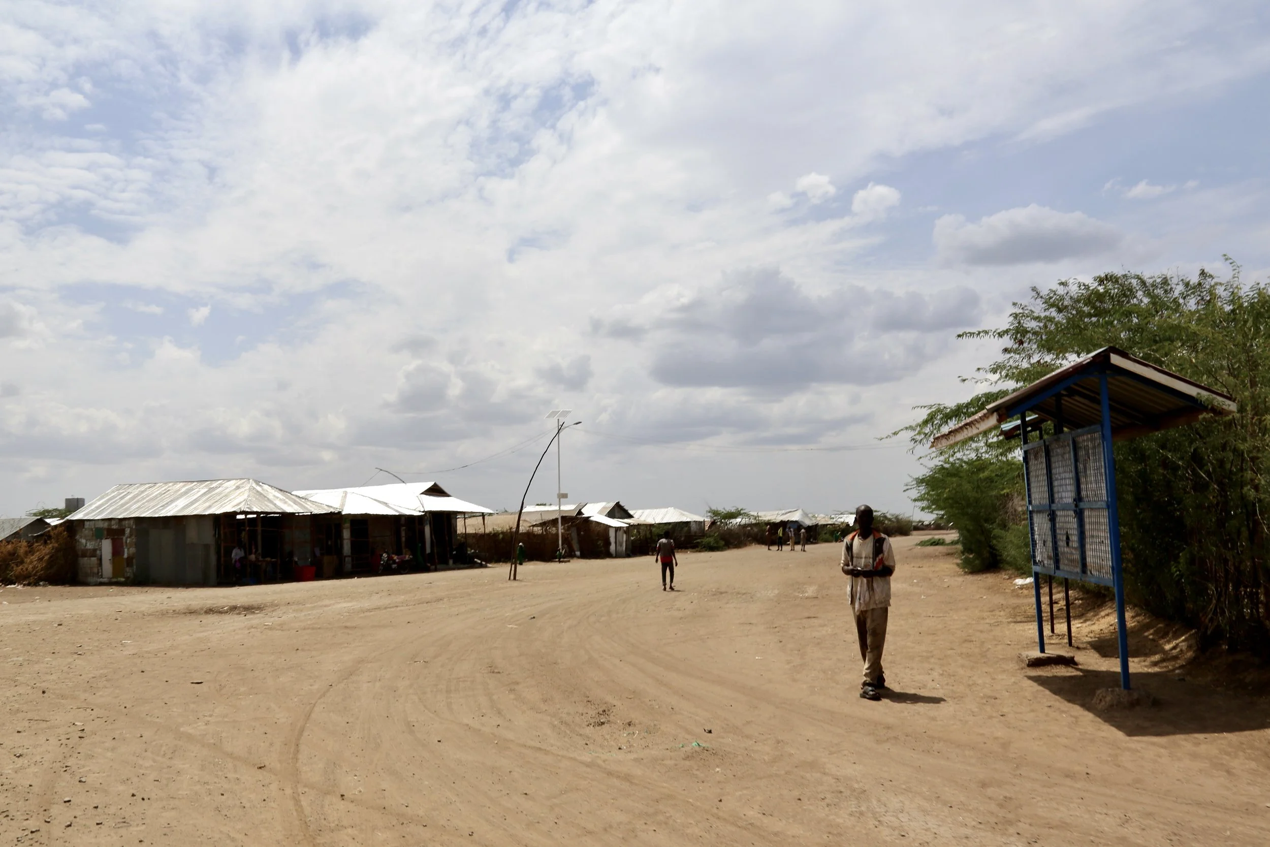 The dusty ground behind the protection compound where Evariste was living in Kakuma refugee camp. Though safer there than outside, isolation remained part of daily life.
